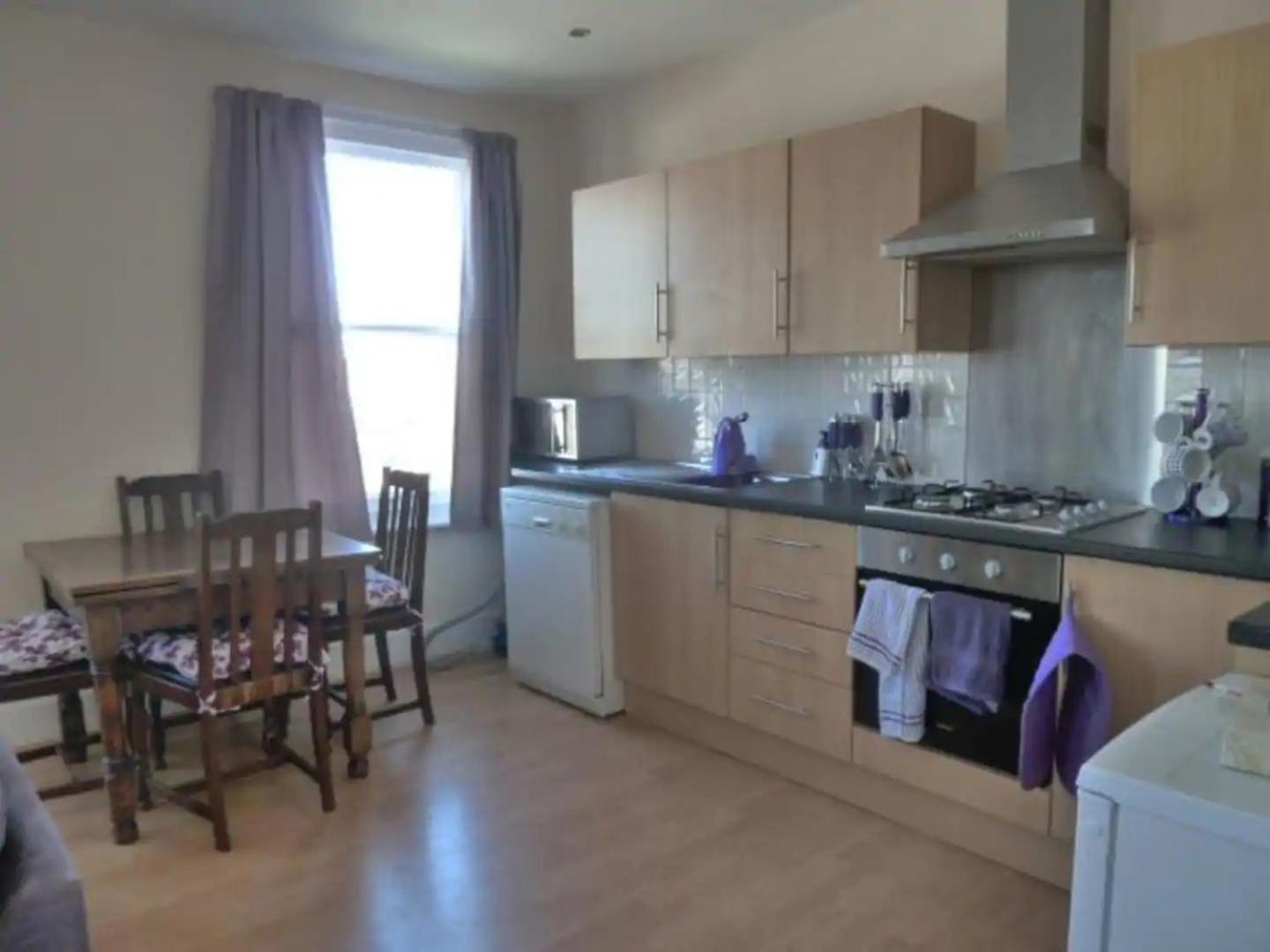 Top floor flat with sea view view 2