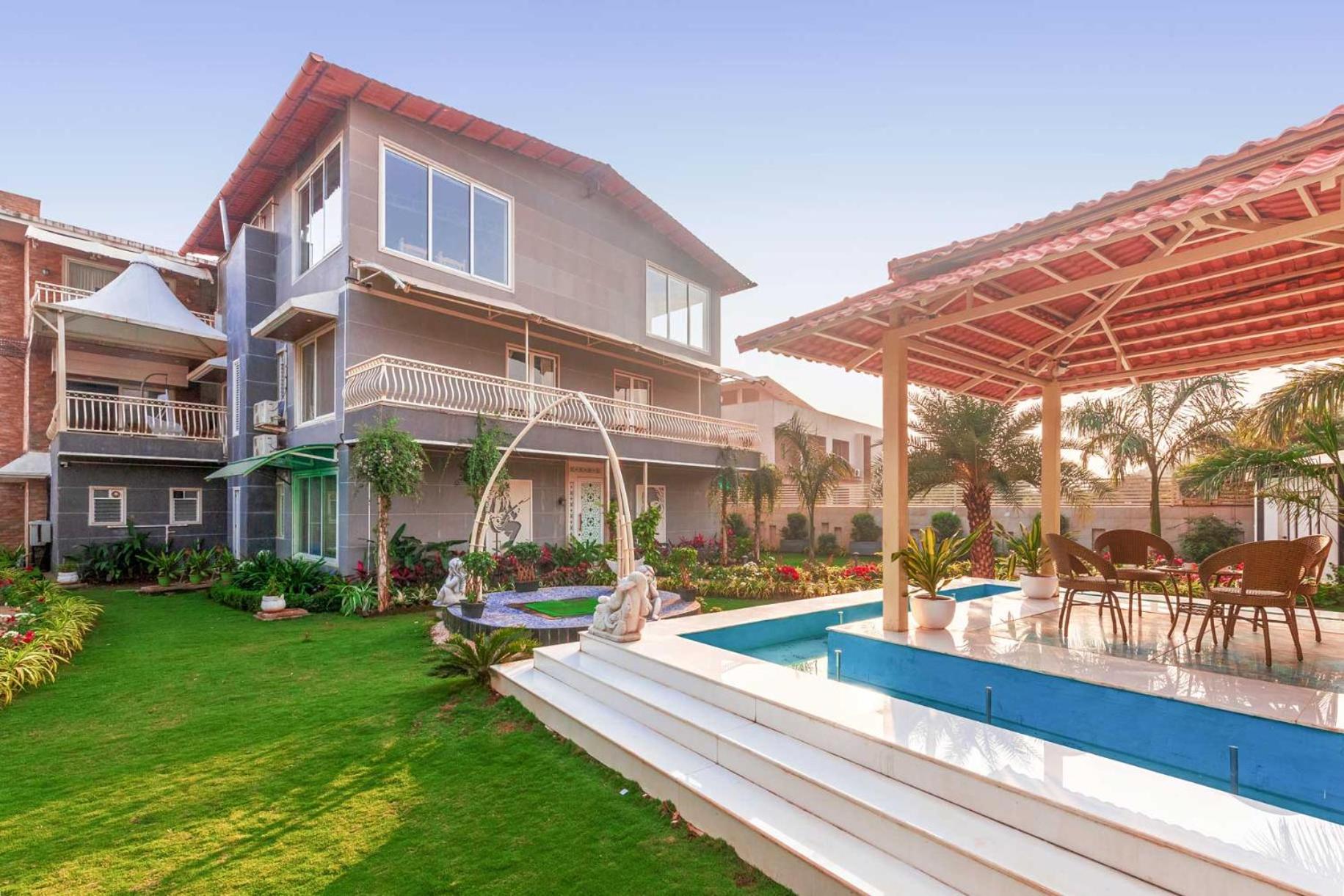 Lonavala Vacations - Ayurkutir Villa by StayVista - Pool, gym, and snooker table for your ultimate relaxation and entertainment - Property Image 1