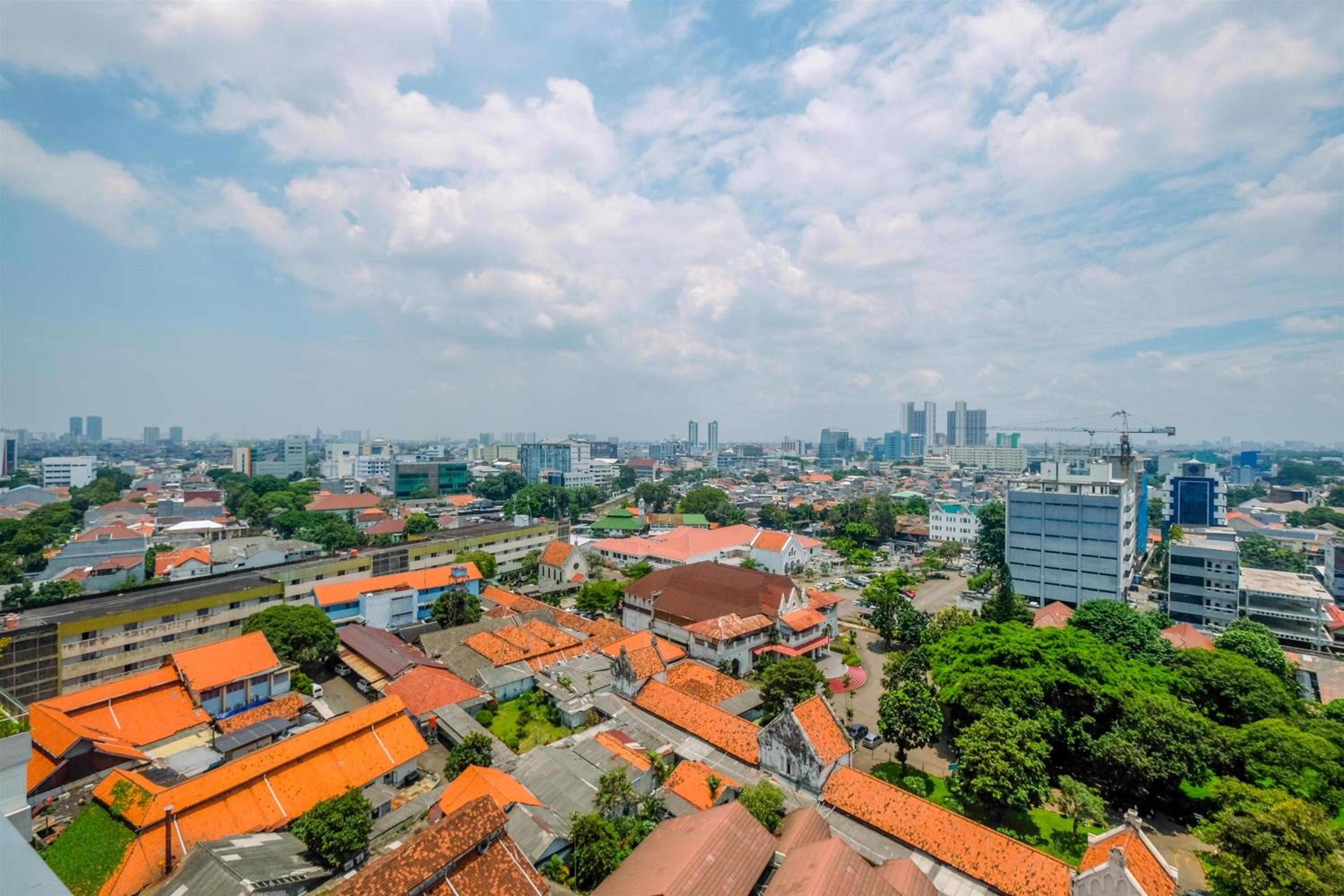 Warm and Cozy Studio Room at Menteng Park Apartment By Travelio view 2