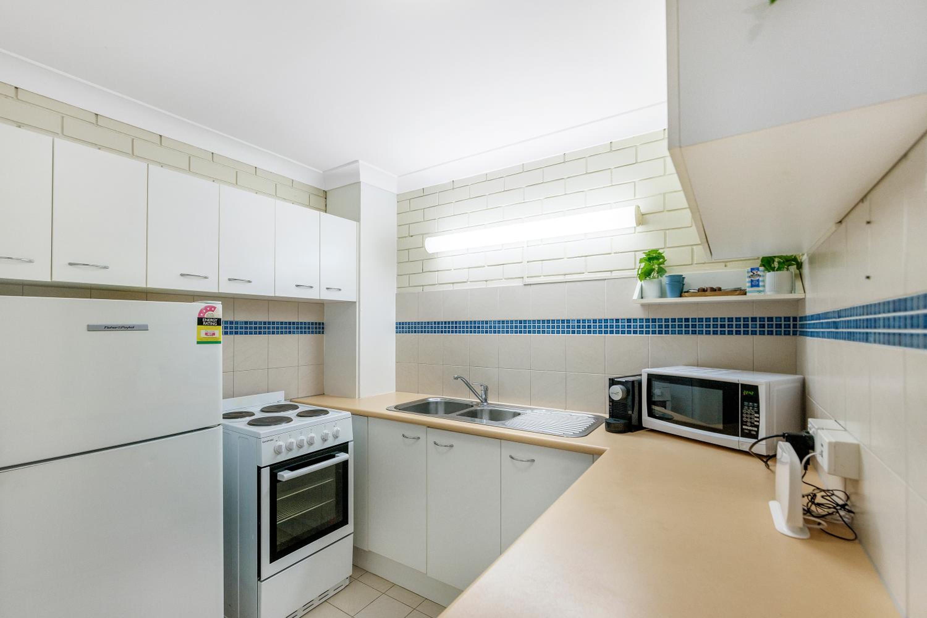 Surfers Paradise- meters from the beach!