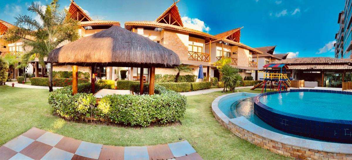 Bangalô com área de lazer estilo resort