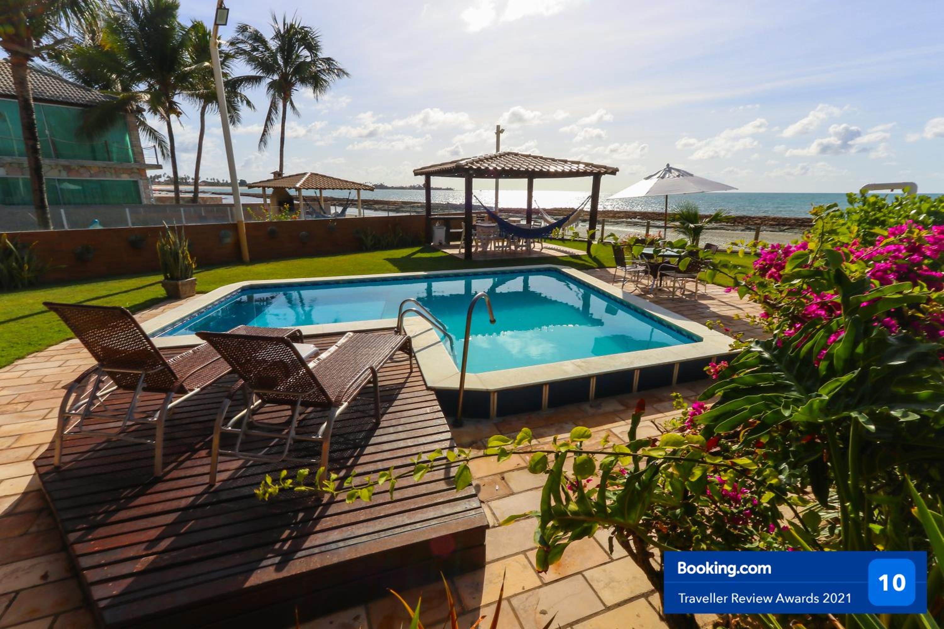 Casa a beira mar com 4 suites e muito conforto