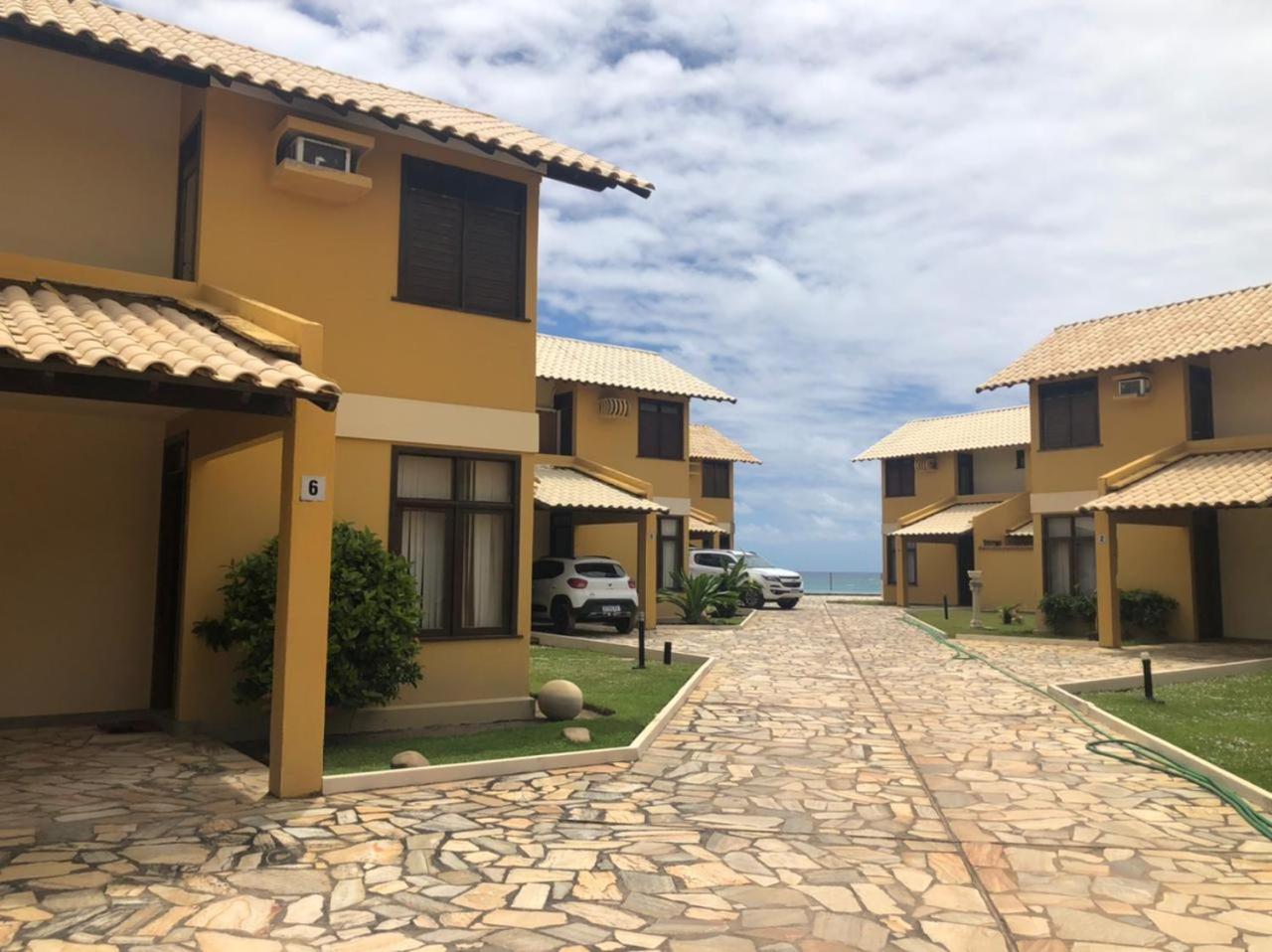 Casa de praia em condomínio à beira mar