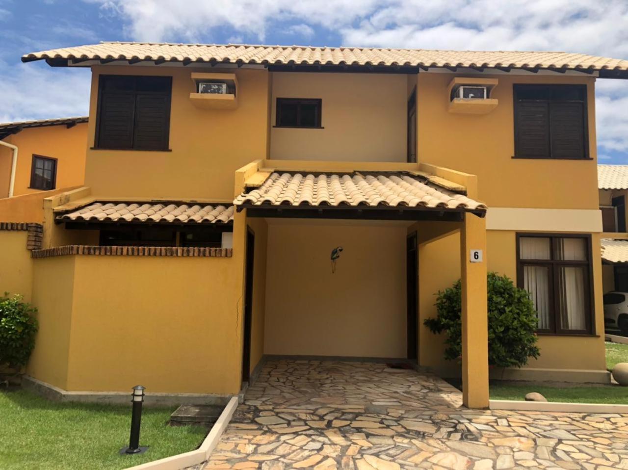 Casa de praia em condomínio à beira mar
