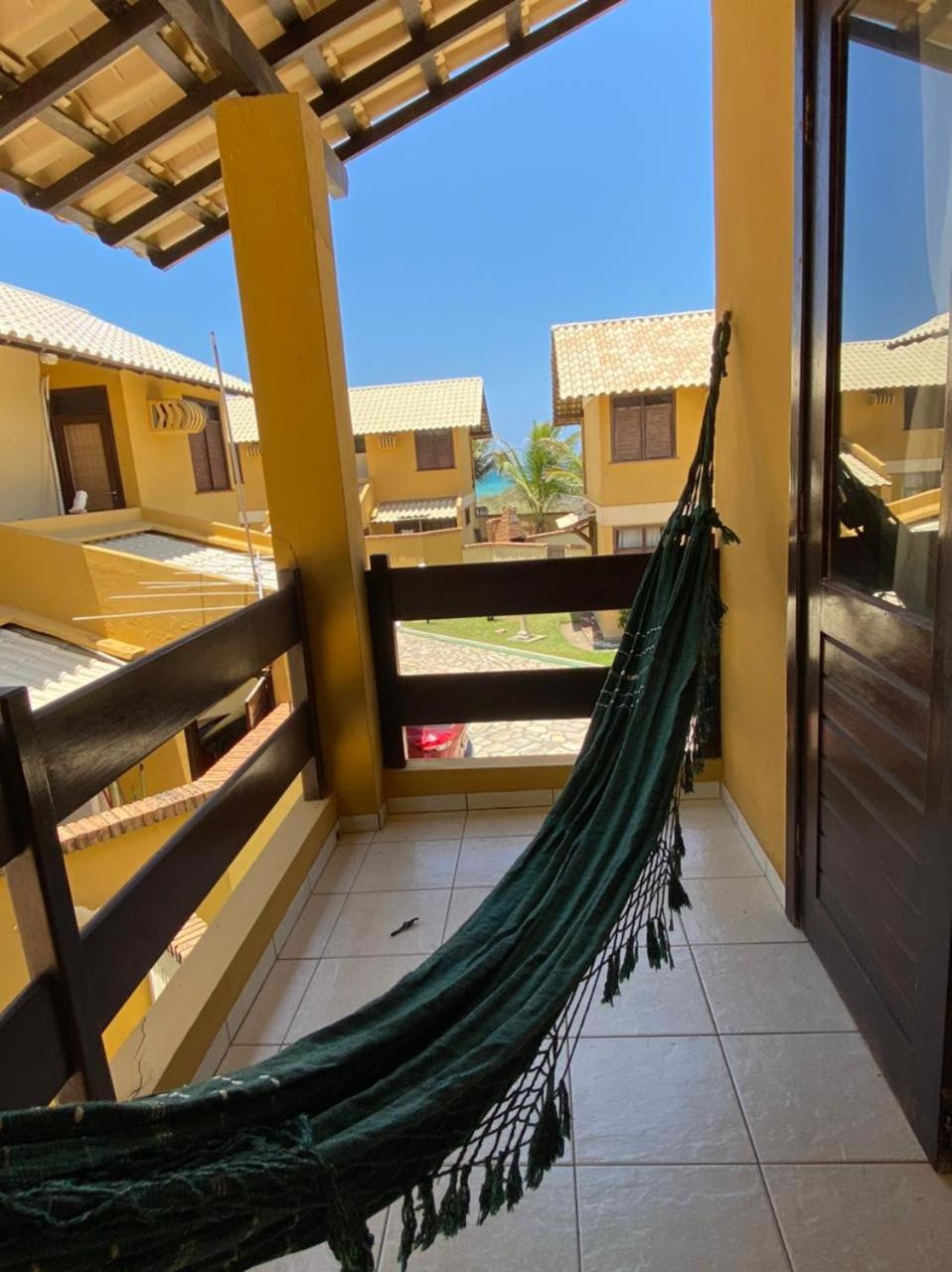 Casa de praia em condomínio à beira mar