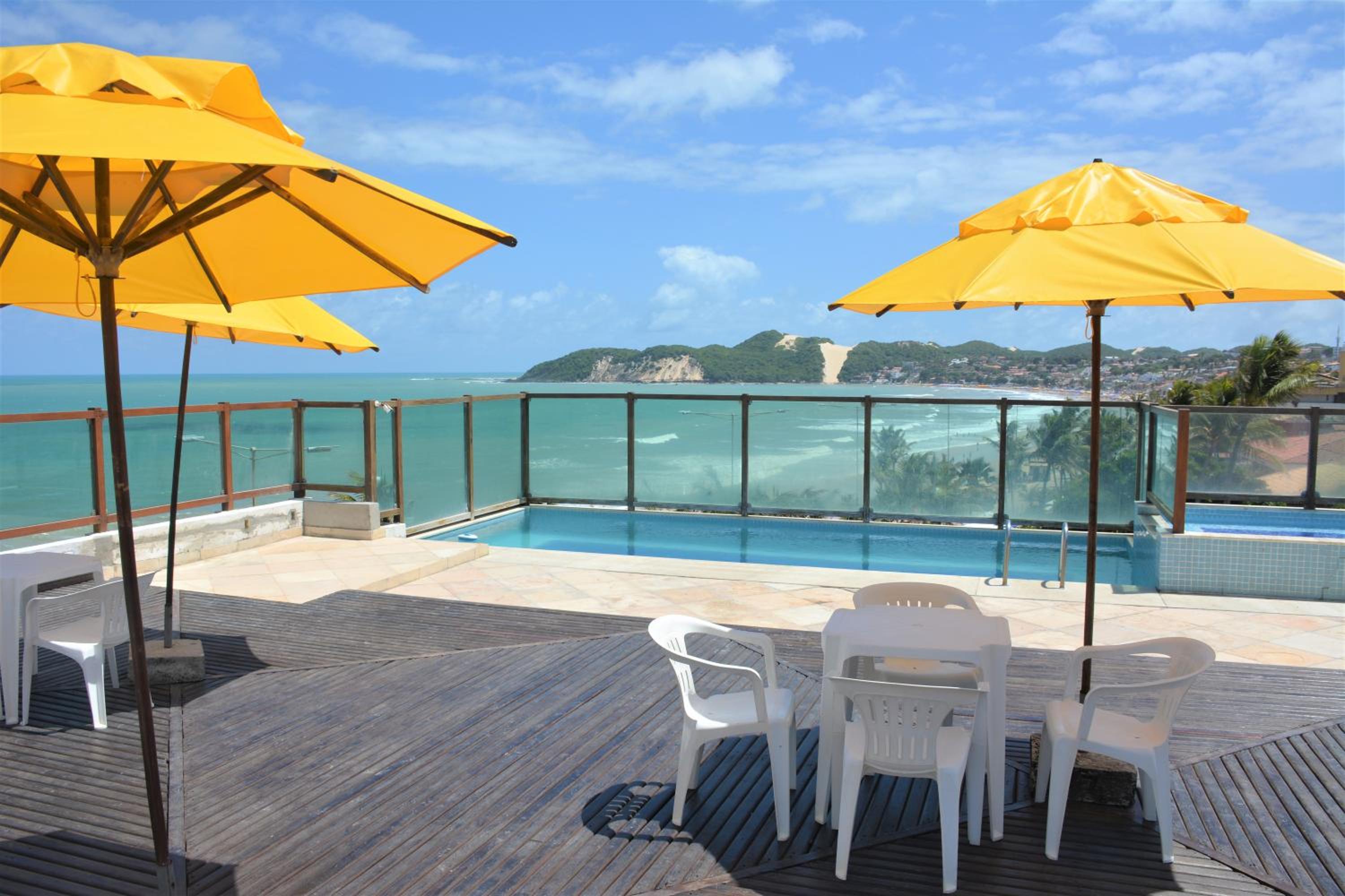 Na praia - Araça 206 Luxo - Lateral vista jardim