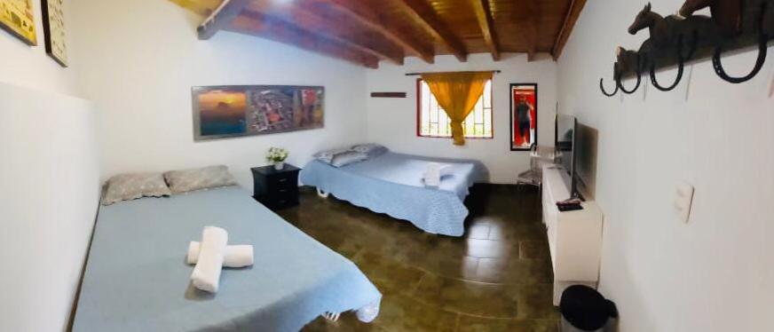 Casa Roja Parche Campestre - Hospedaje Guatapé