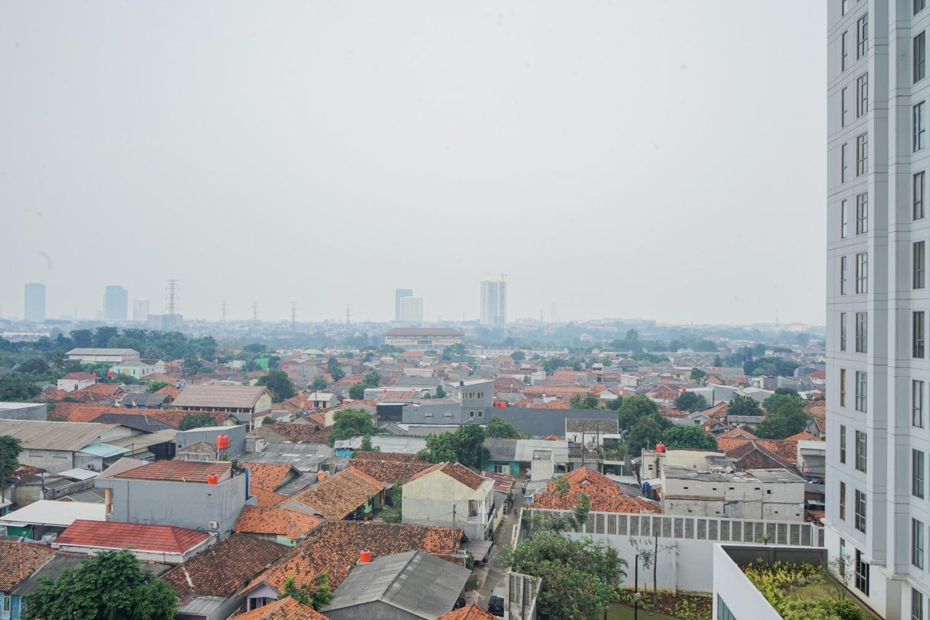 Cozy Living 2BR at M-Town Residence Apartment By Travelio view 3