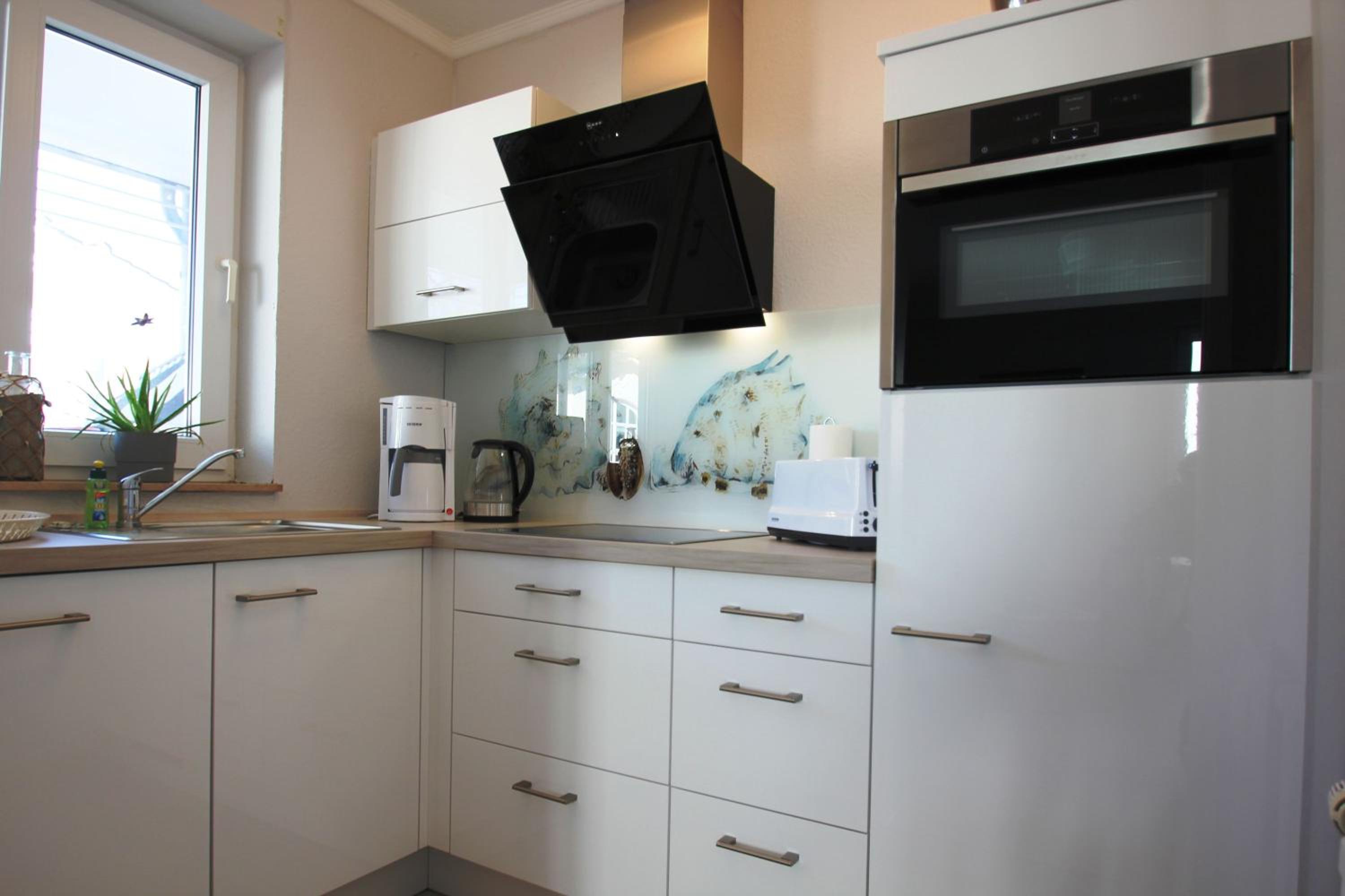 zentrale FeWo mit Balkon, gratis Nutzung vom AHOI Erlebnisbad und Sauna in Sellin - Villa Buskam FeWo 28