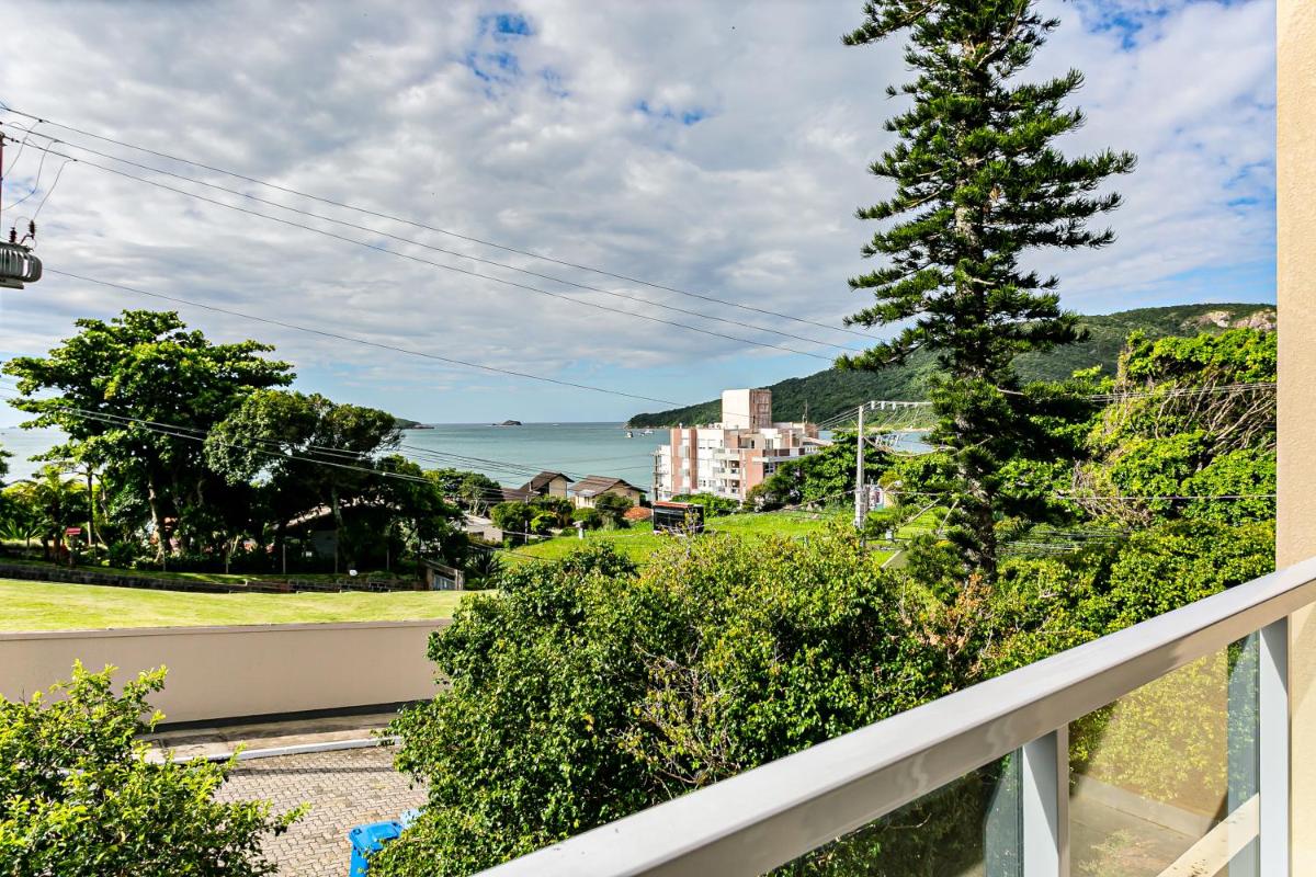 Apto com suíte e sacada vista mar Ingleses LEN203 view 4
