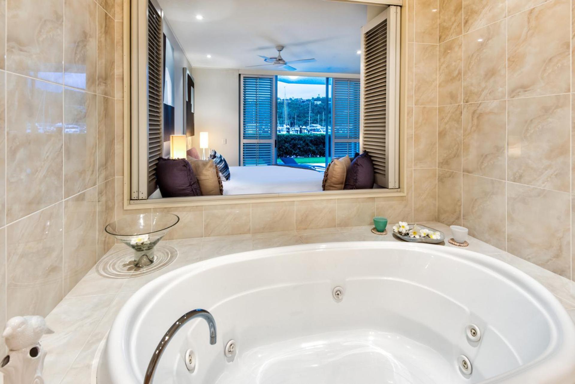 Pavillions 11 on Hamilton Island, waterfront apartment with private pool and buggy