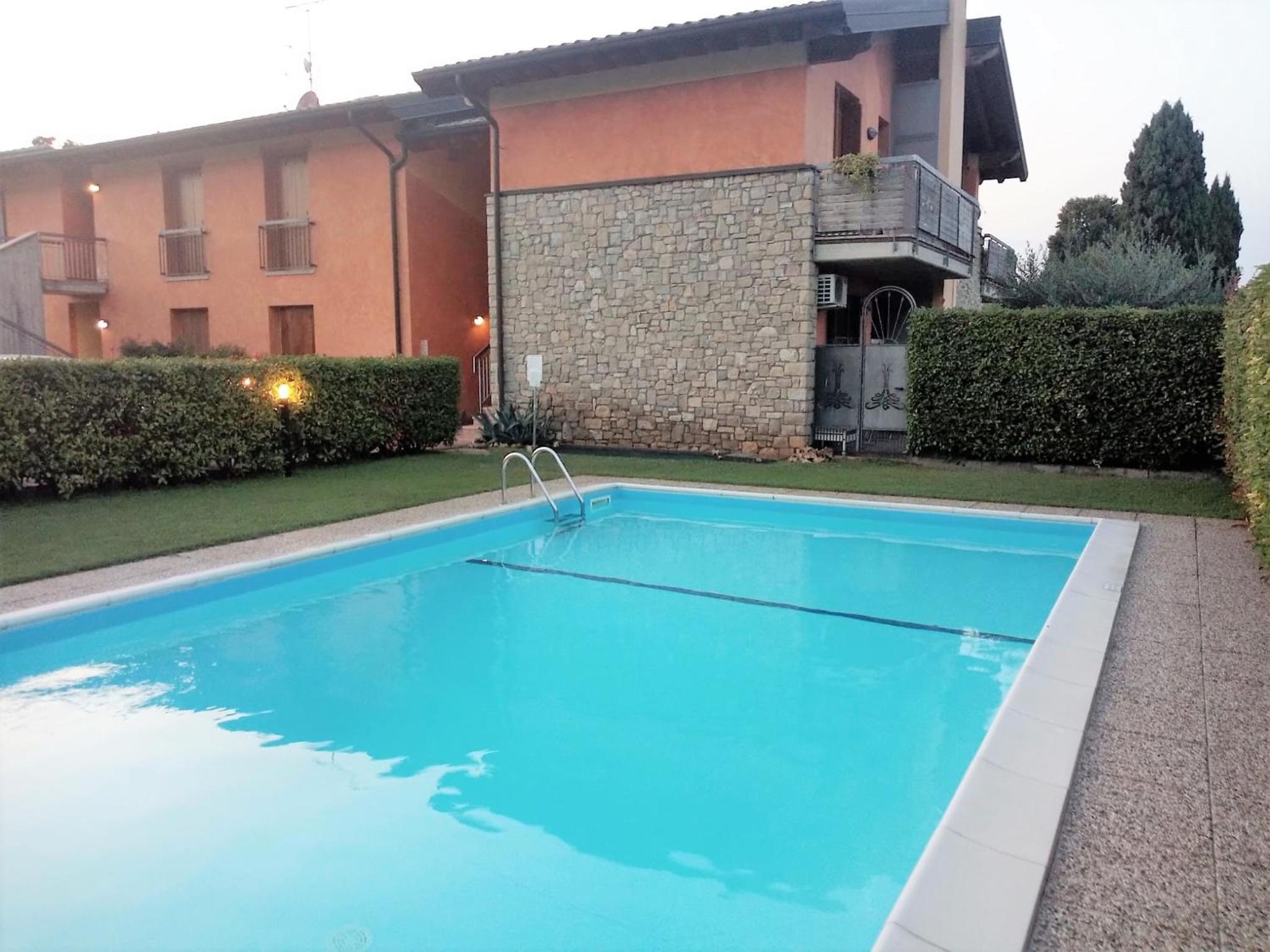DesenzanoLoft Eridania Apartment with private garden and pool view 3