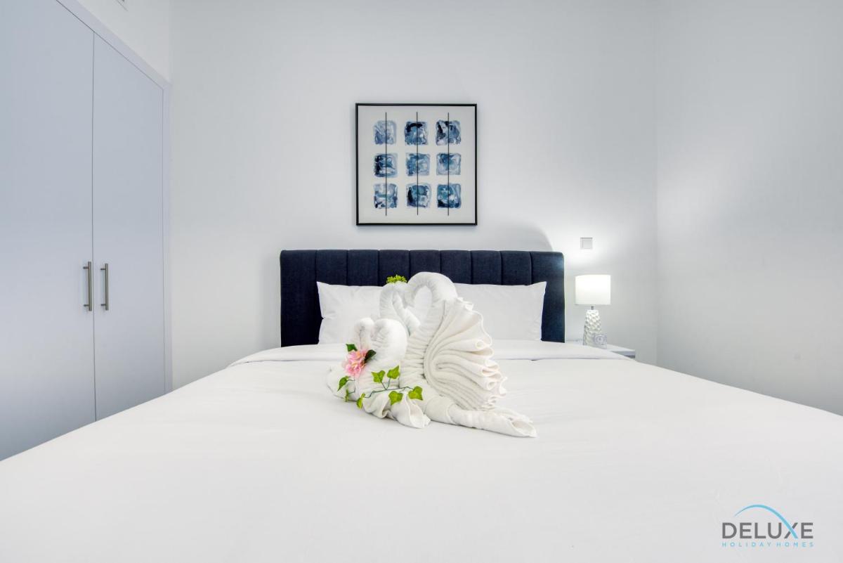 Harmonious 1BR in The Pulse Residences Dubai South by Deluxe Holiday Homes