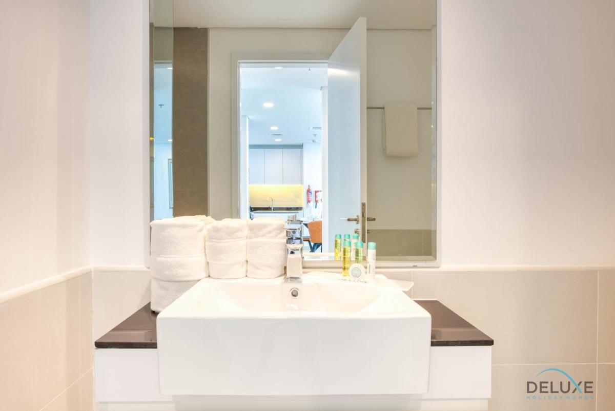 Harmonious 1BR in The Pulse Residences Dubai South by Deluxe Holiday Homes