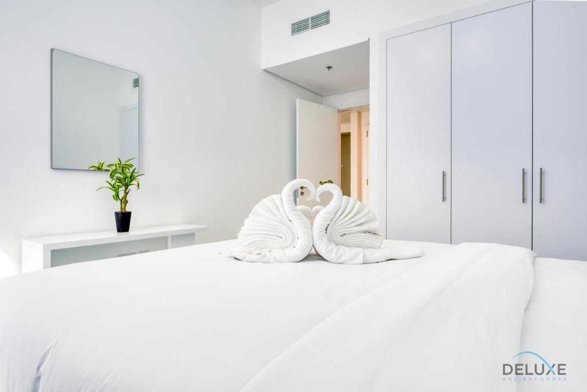Harmonious 1BR in The Pulse Residences Dubai South by Deluxe Holiday Homes