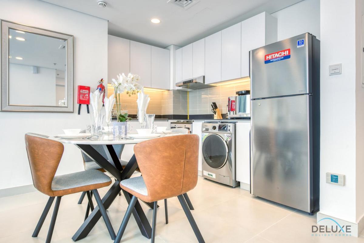 Harmonious 1BR in The Pulse Residences Dubai South by Deluxe Holiday Homes