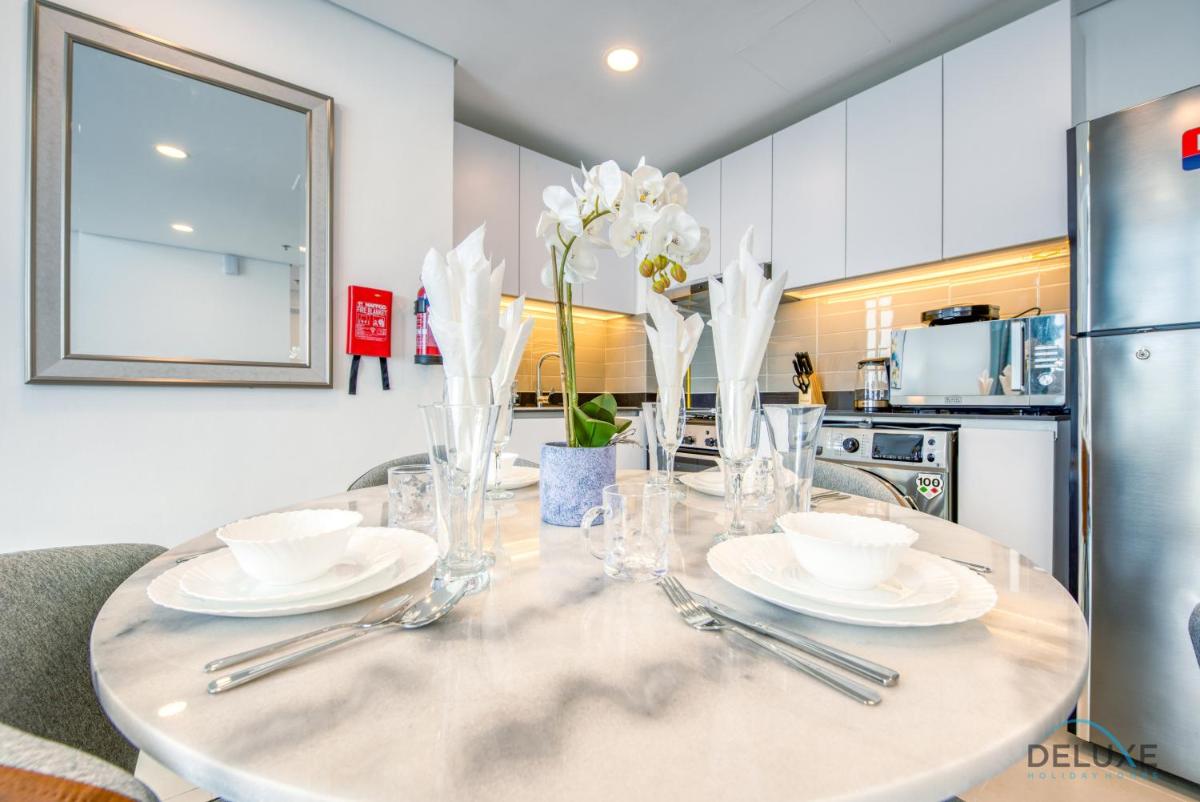 Harmonious 1BR in The Pulse Residences Dubai South by Deluxe Holiday Homes