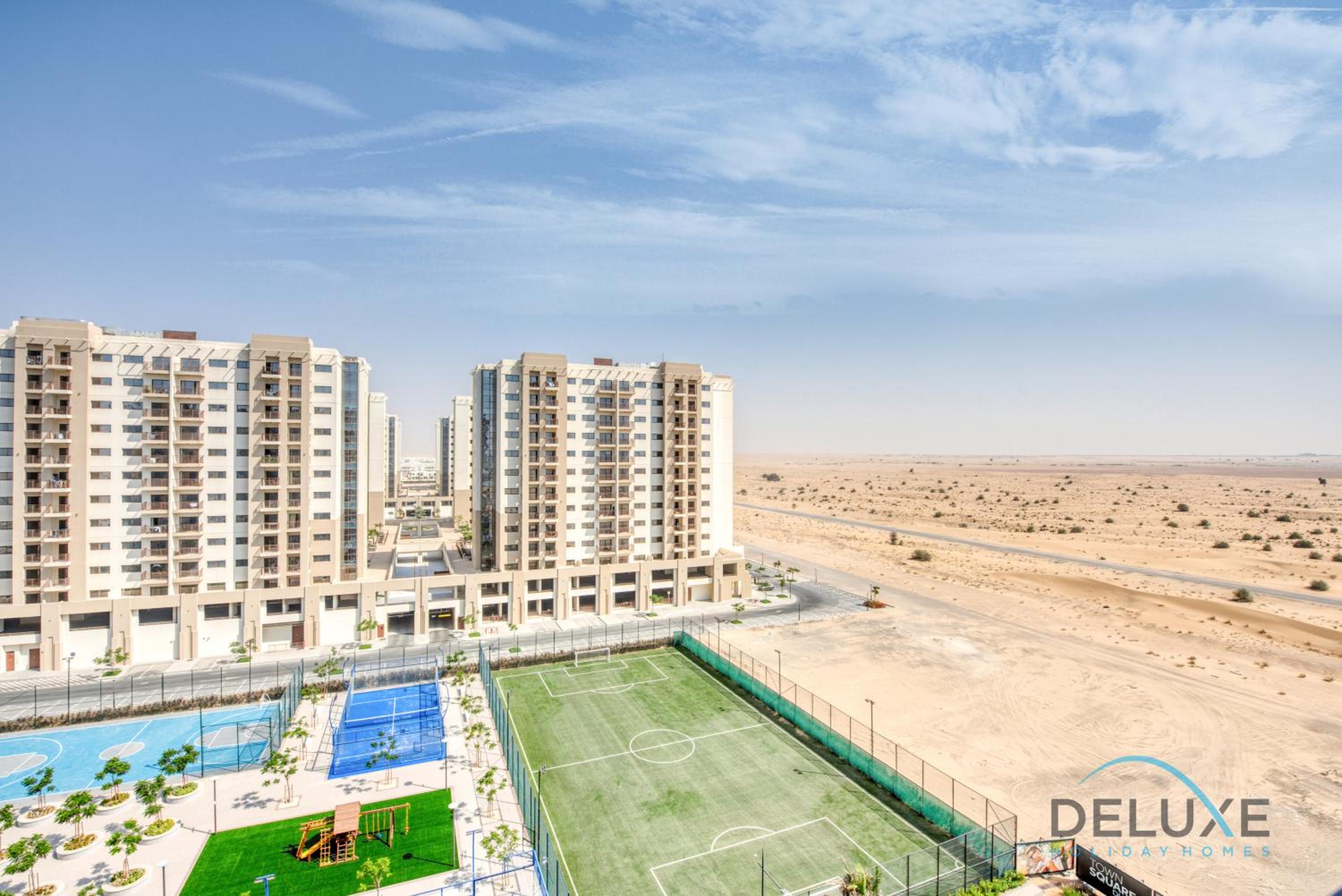 Chic 1BR in Town Square UNA Dubailand by Deluxe Holiday Homes