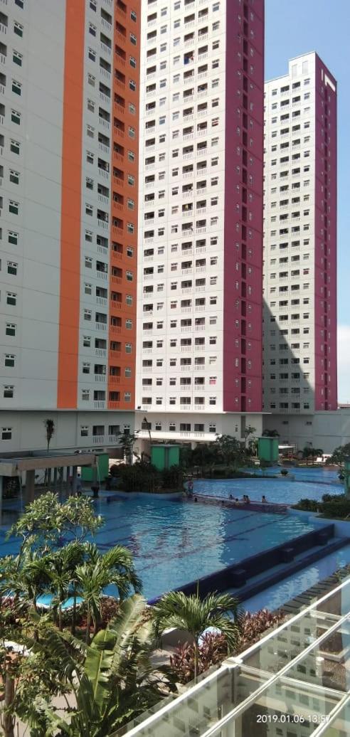 Compact and Comfy 2BR Green Pramuka City view 2