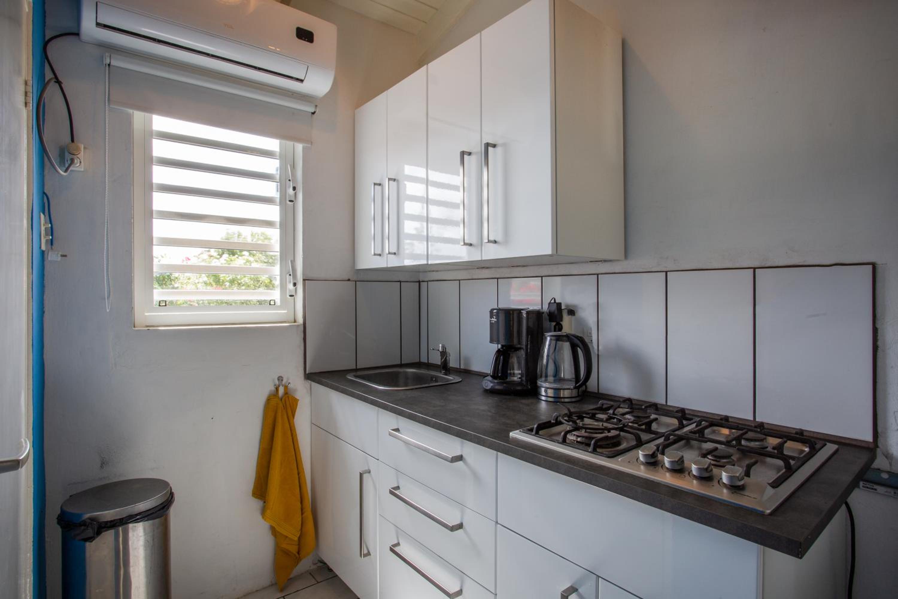Studio at the pool in tropical Resort Seru Coral with privacy and large pool