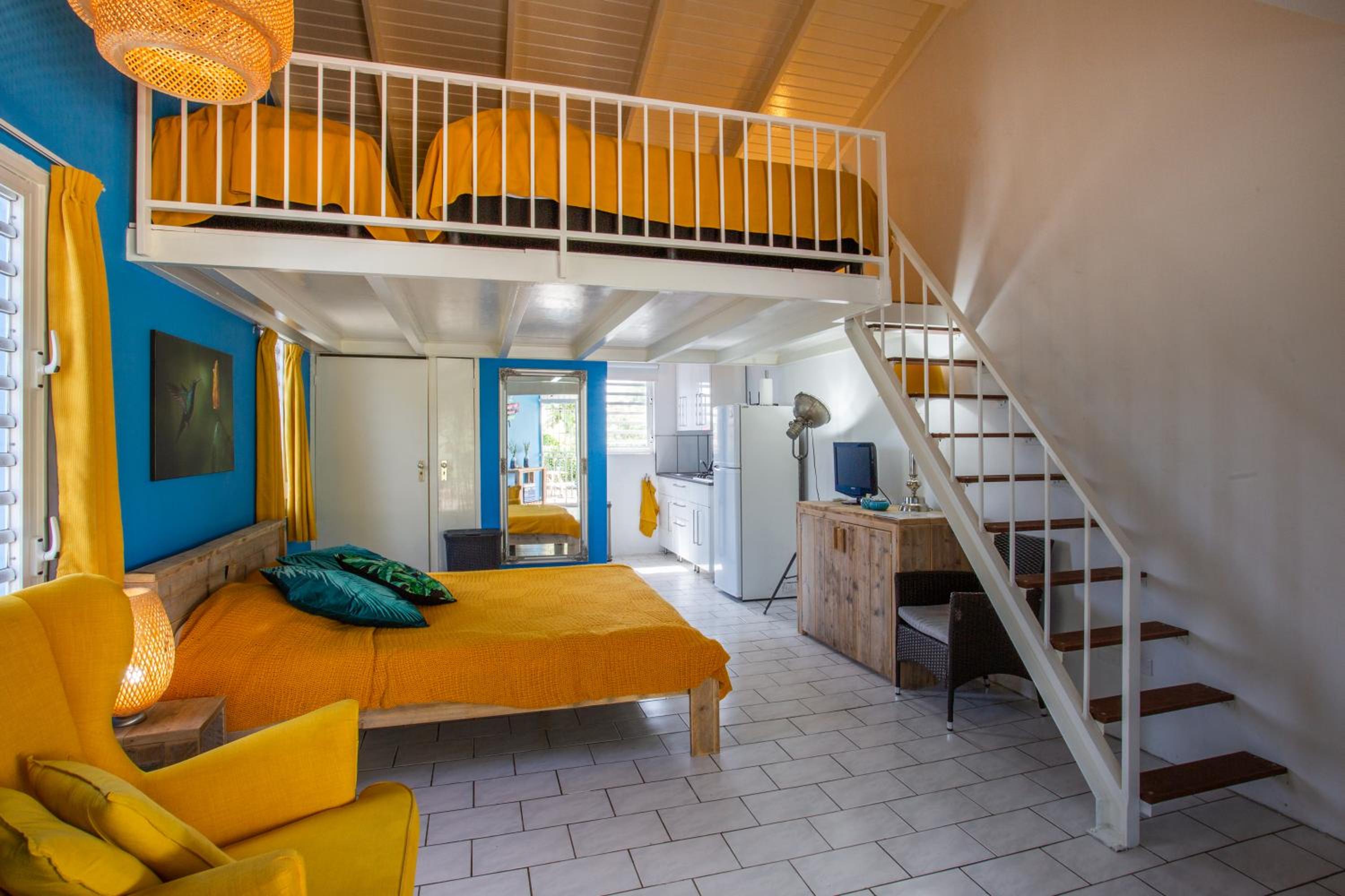 Studio at the pool in tropical Resort Seru Coral with privacy and large pool