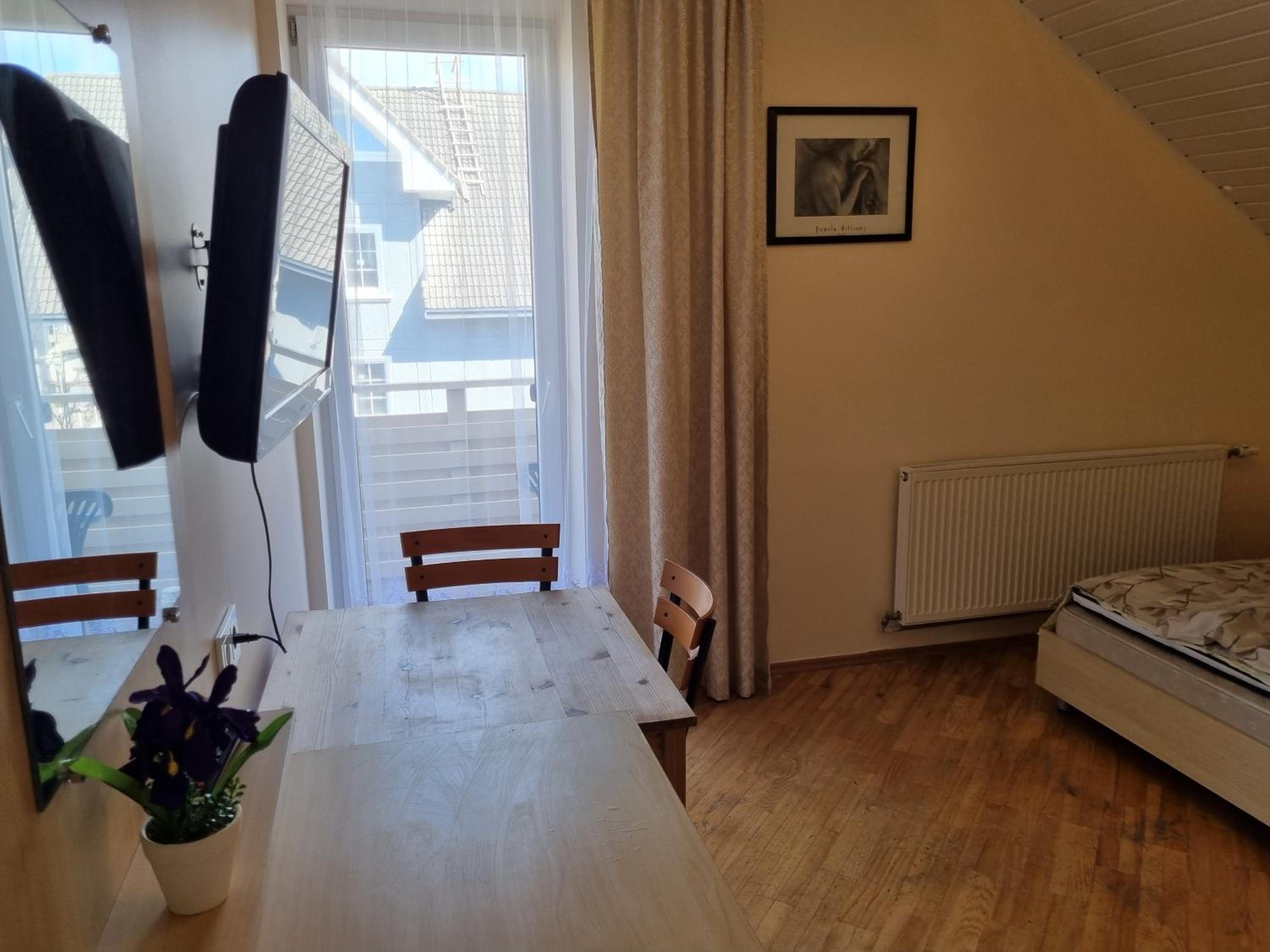 Livingpalanga Meta su balkonu
