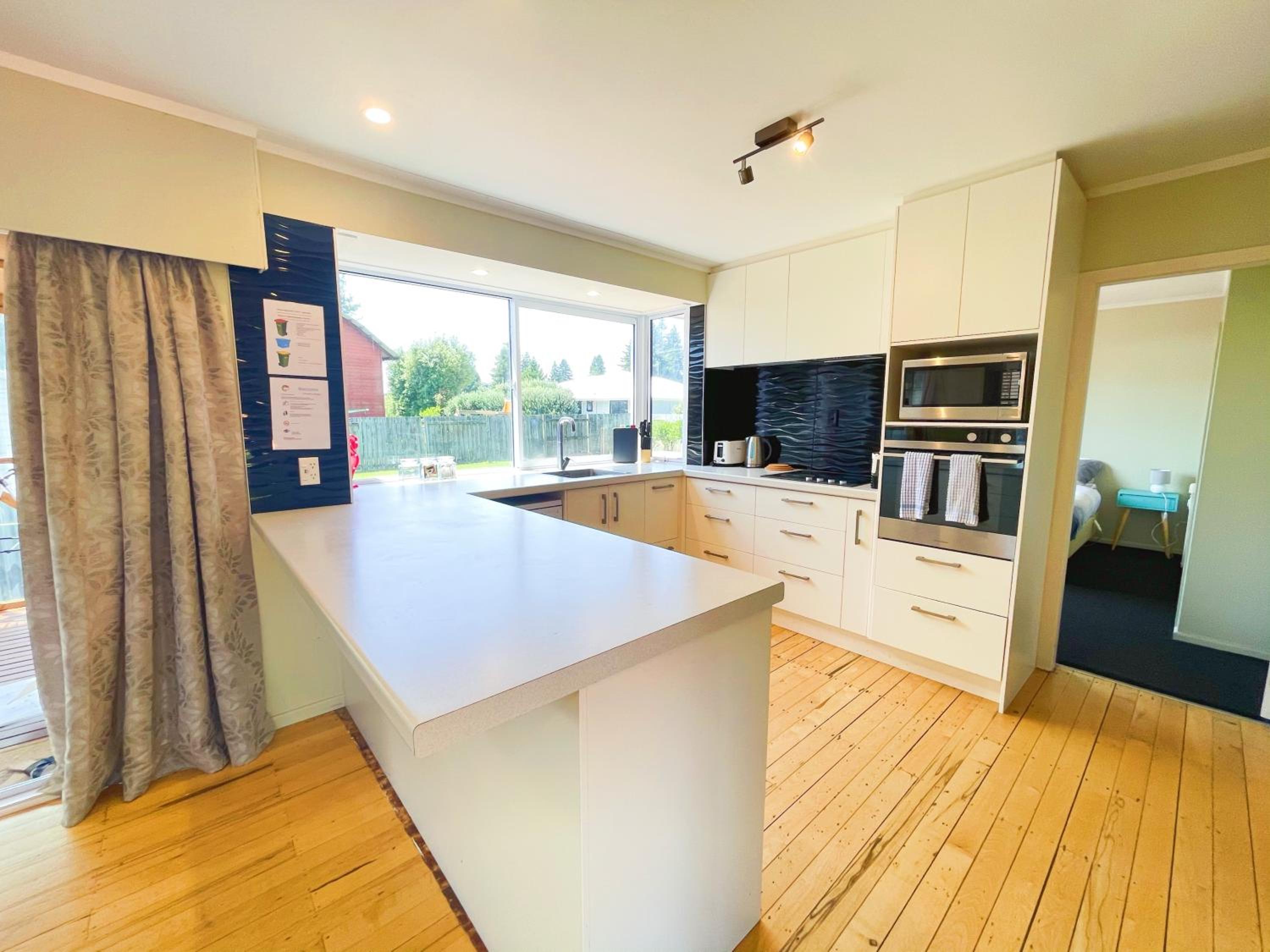 Cosy family home with a sunny deck view 5