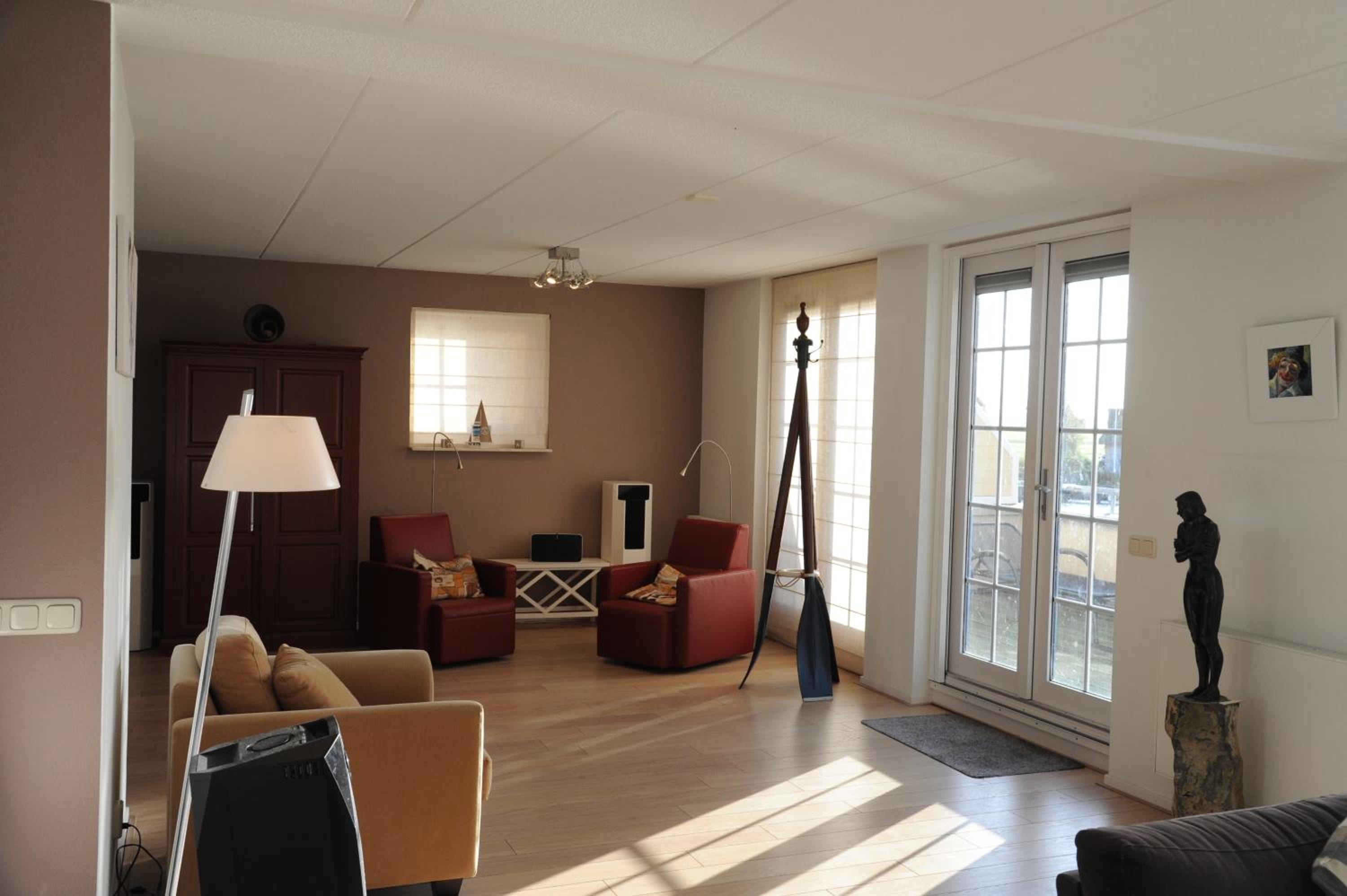 Peaceful boathouse located in a water activity-rich area view 5