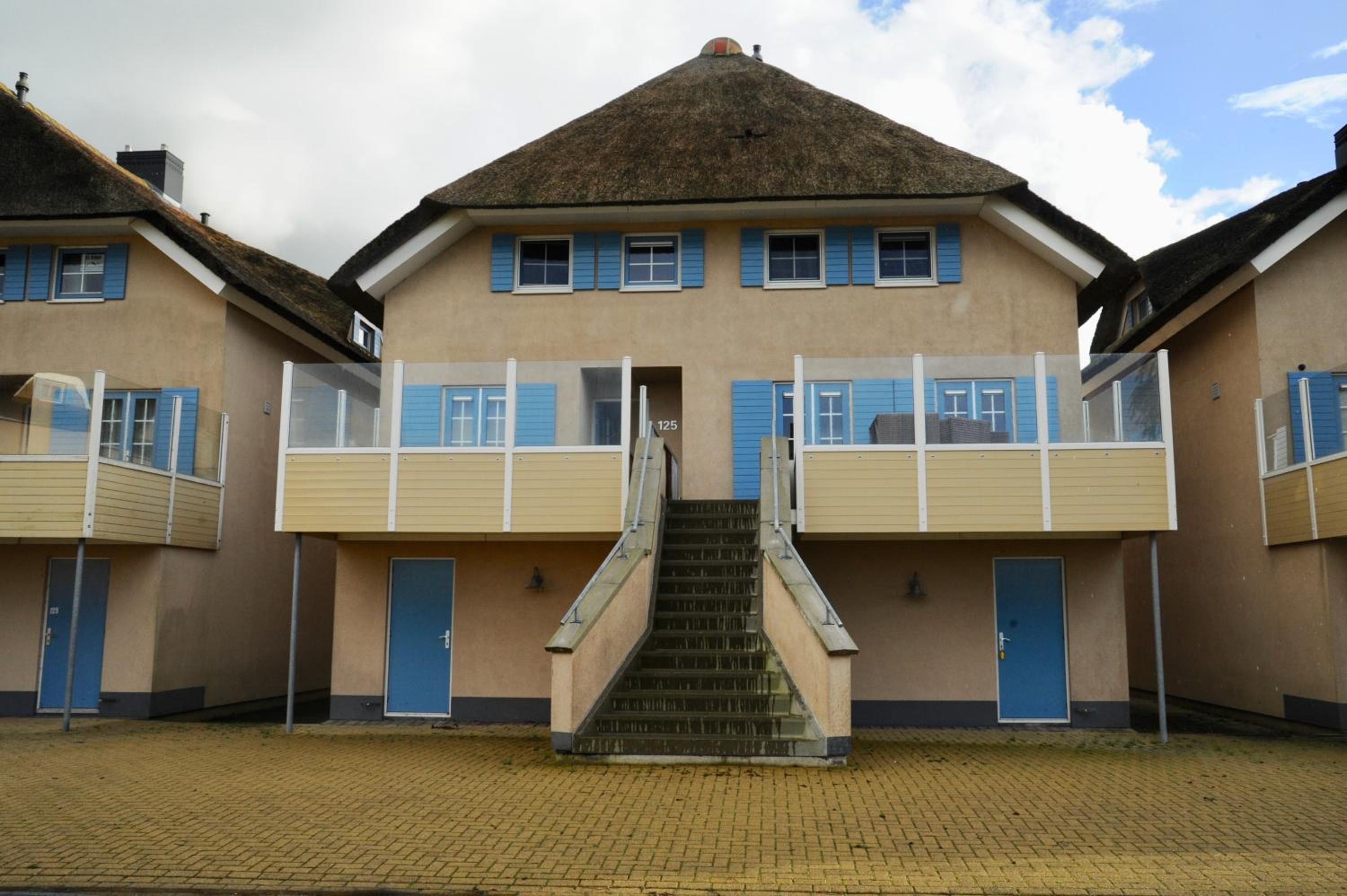 Peaceful boathouse located in a water activity-rich area view 2