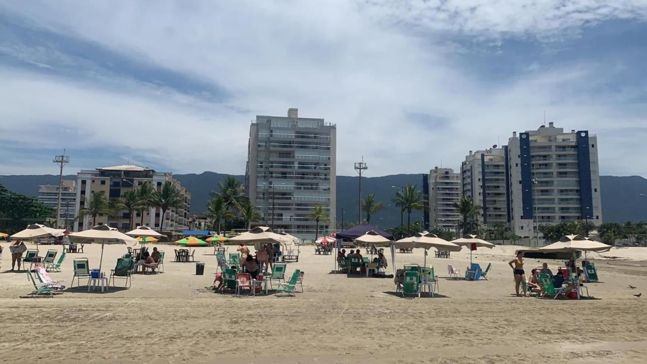 Home Ap Cinema Frente Mar em Bertioga
