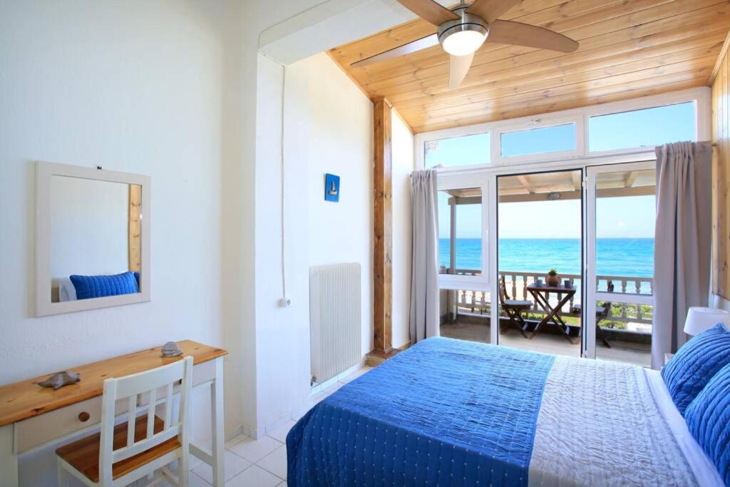 Flokos. Lazy days, balmy nights on the seafront view 2