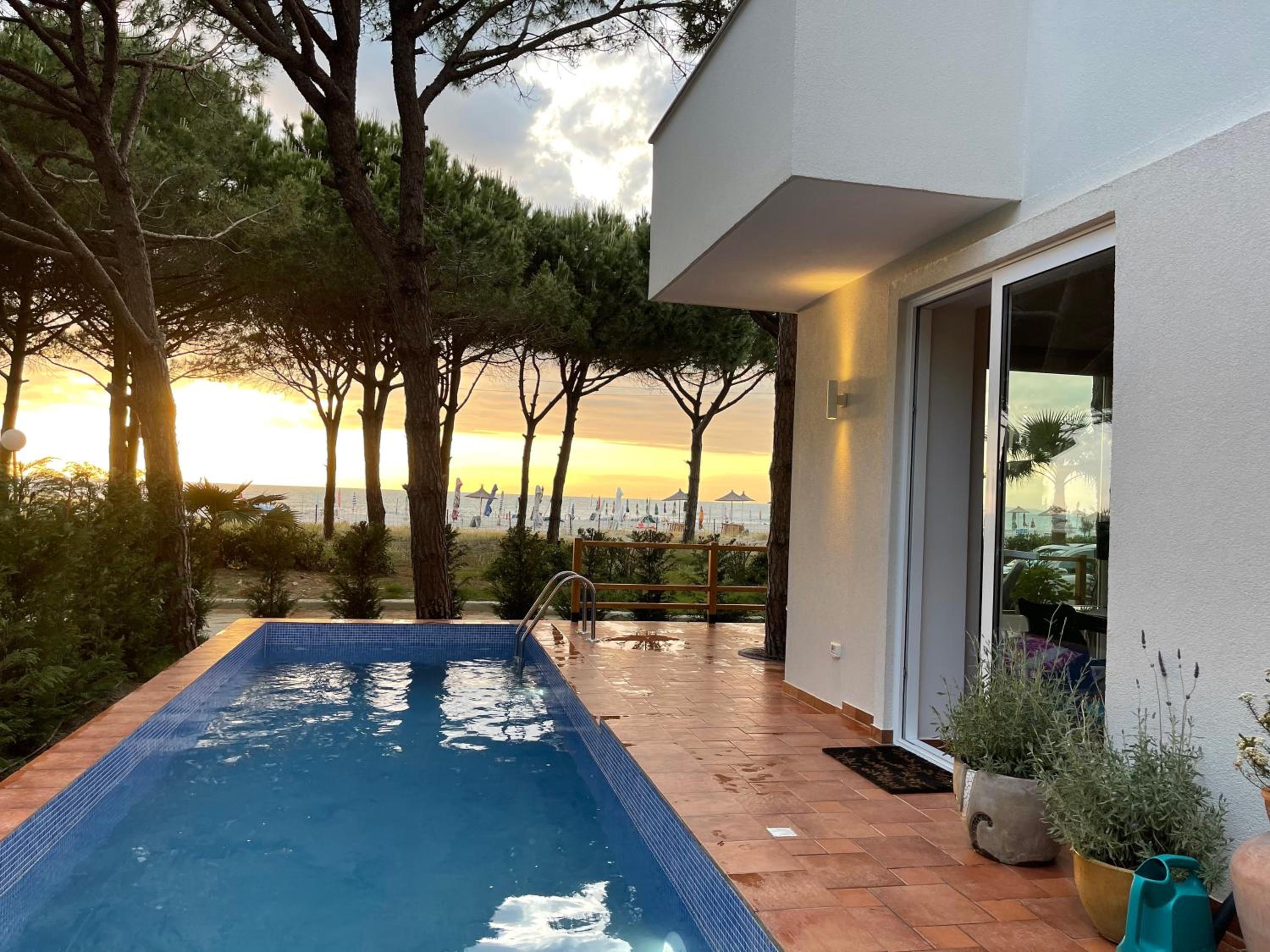 Beachfront villa in Qerret beach with a private pool