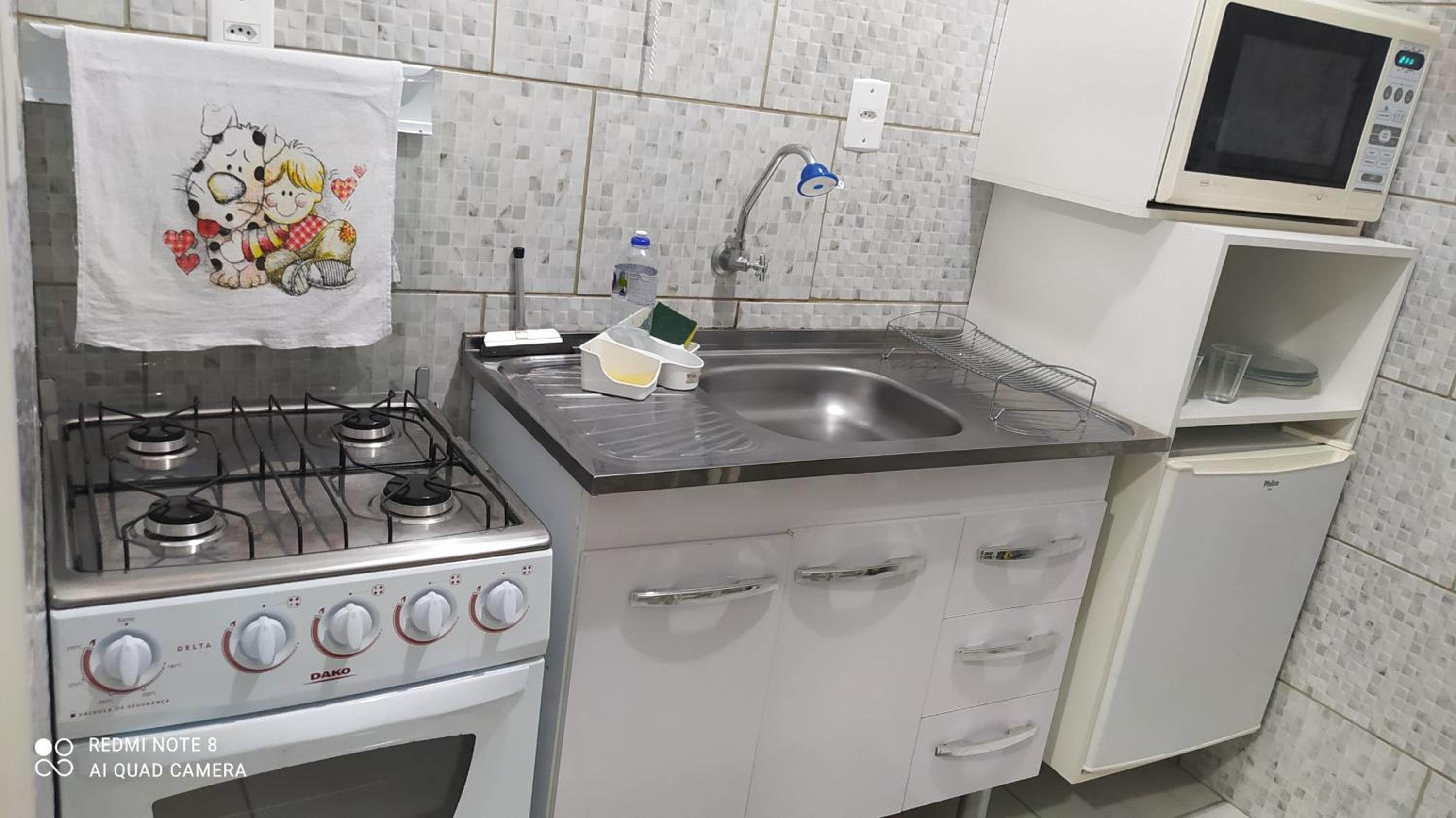 Flat familiar com ar,wi fi,cozinha e garagem