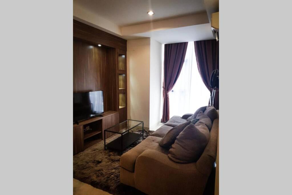 Simple and luxury one bedroom apartment lavenue by sang living view 2
