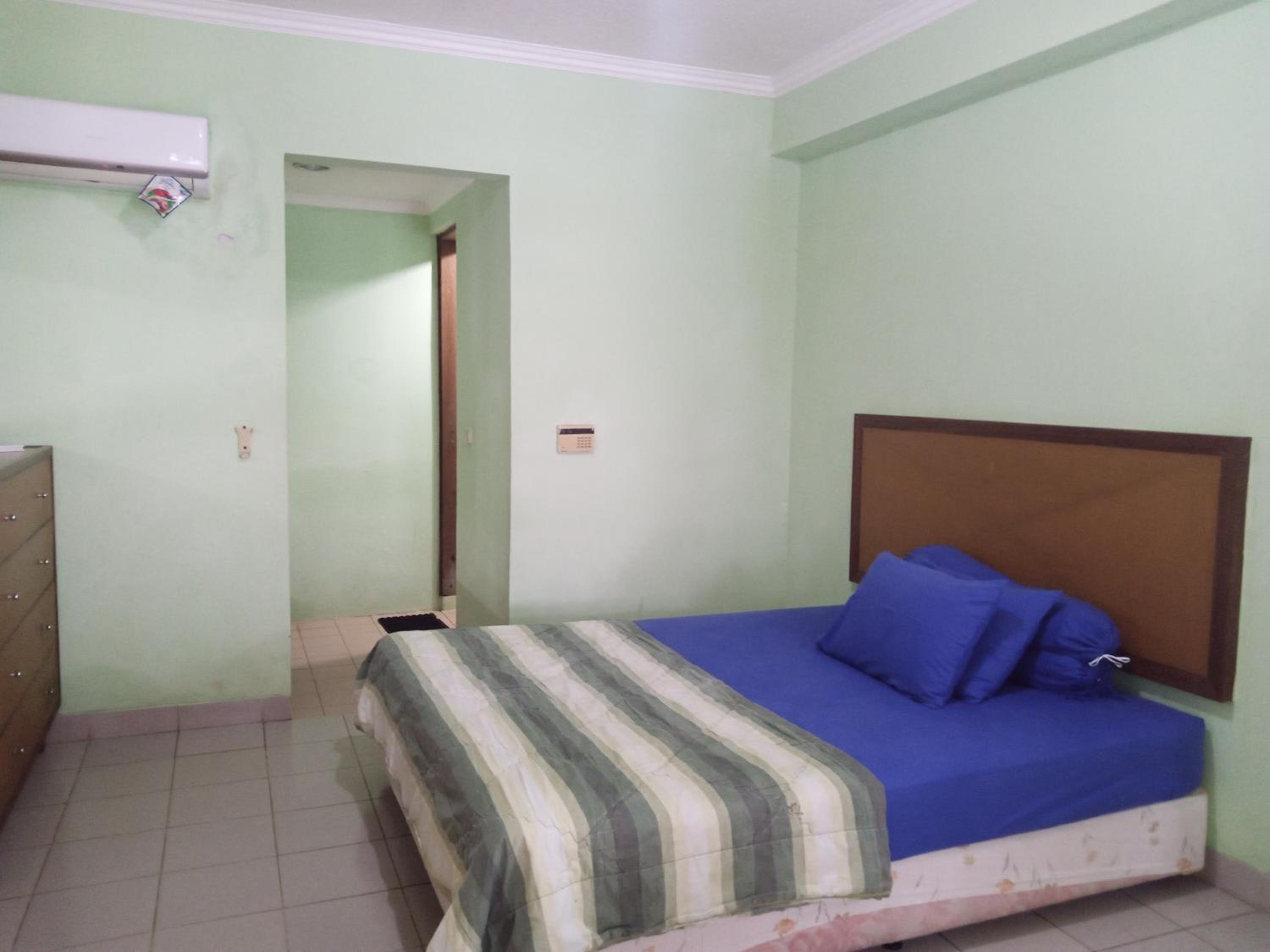 PENGINAPAN KONDOMINIUM CARITA - PAK BoS