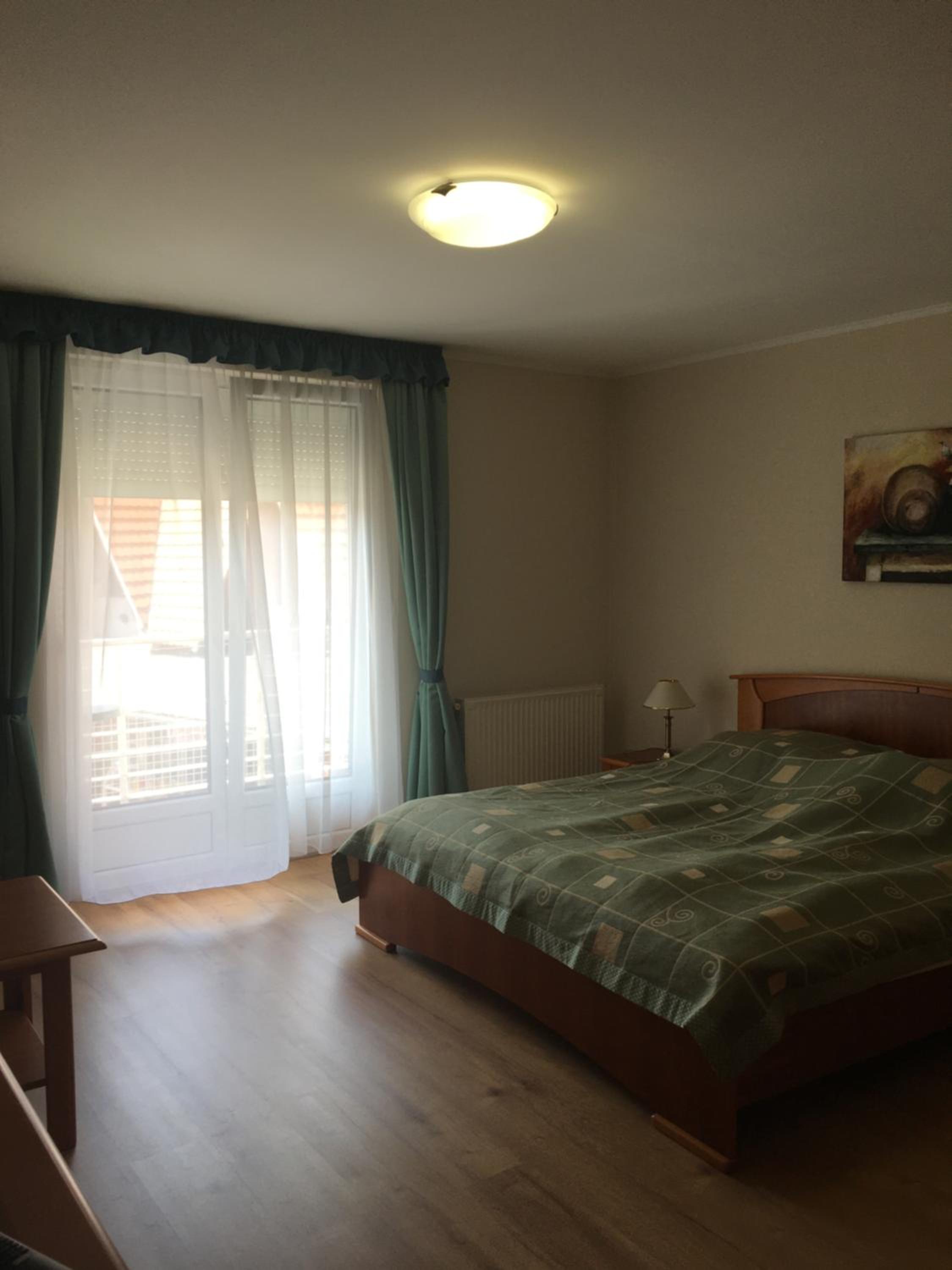 Muskátli Apartmanház