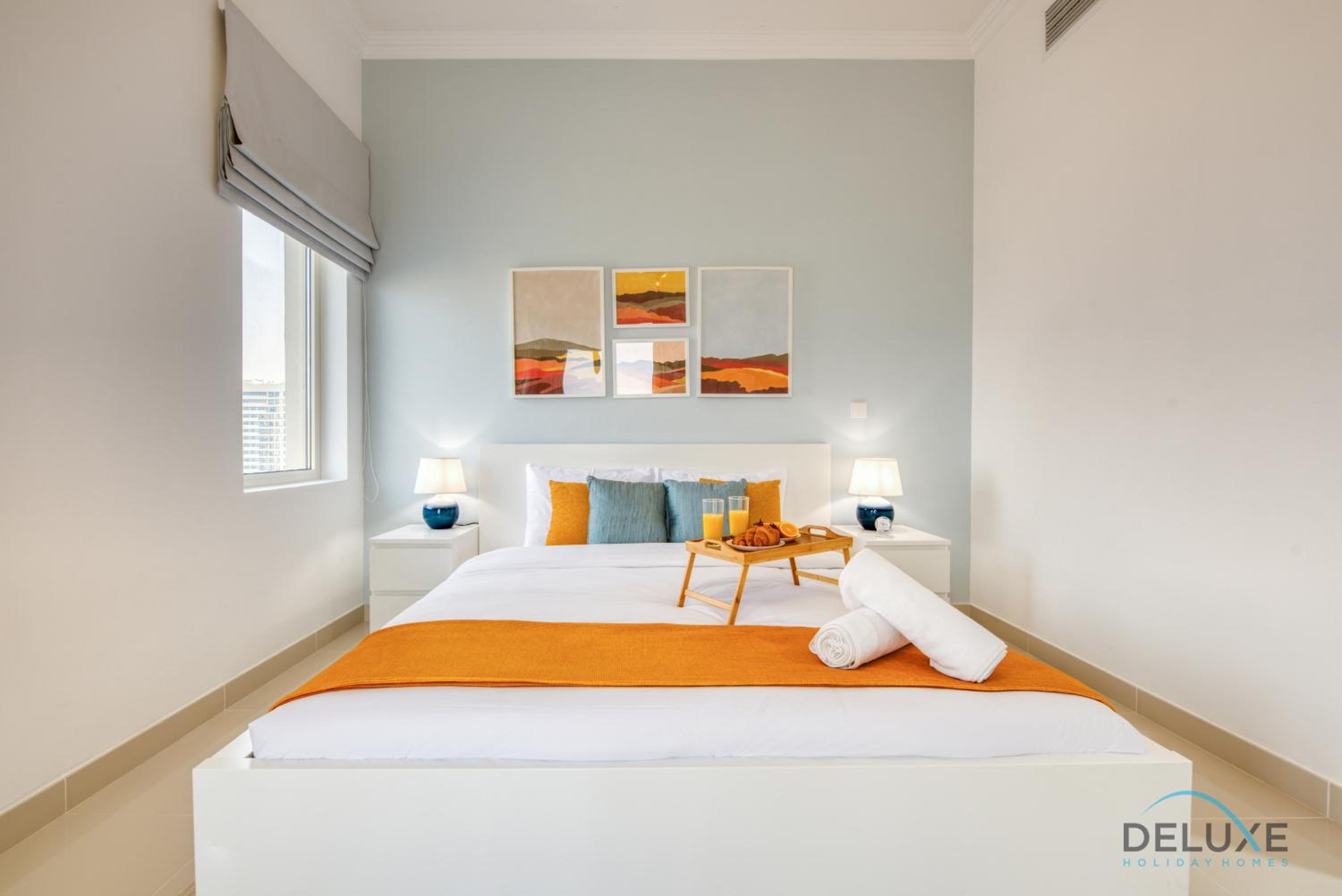 Sunny 1BR at Canal Residences West Dubai Sports City by Deluxe Holiday Homes