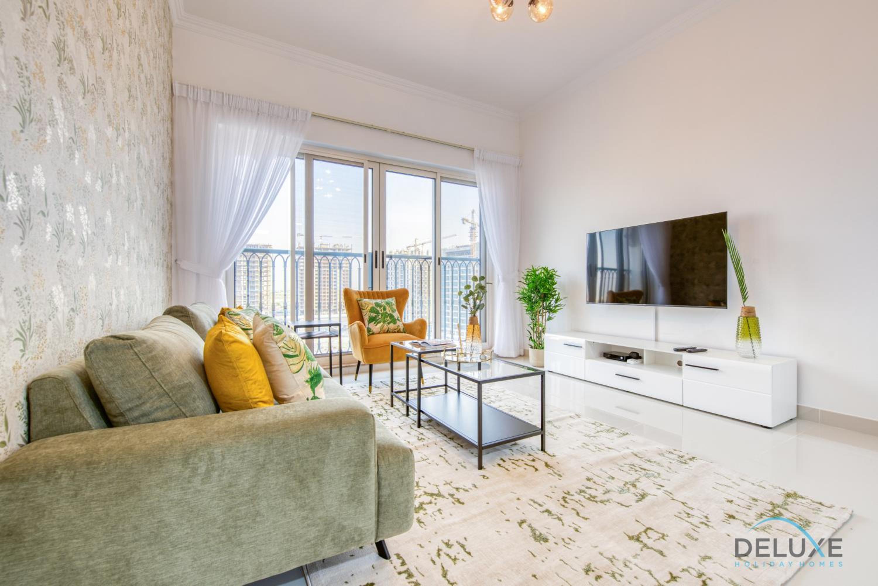 Sunny 1BR at Canal Residences West Dubai Sports City by Deluxe Holiday Homes