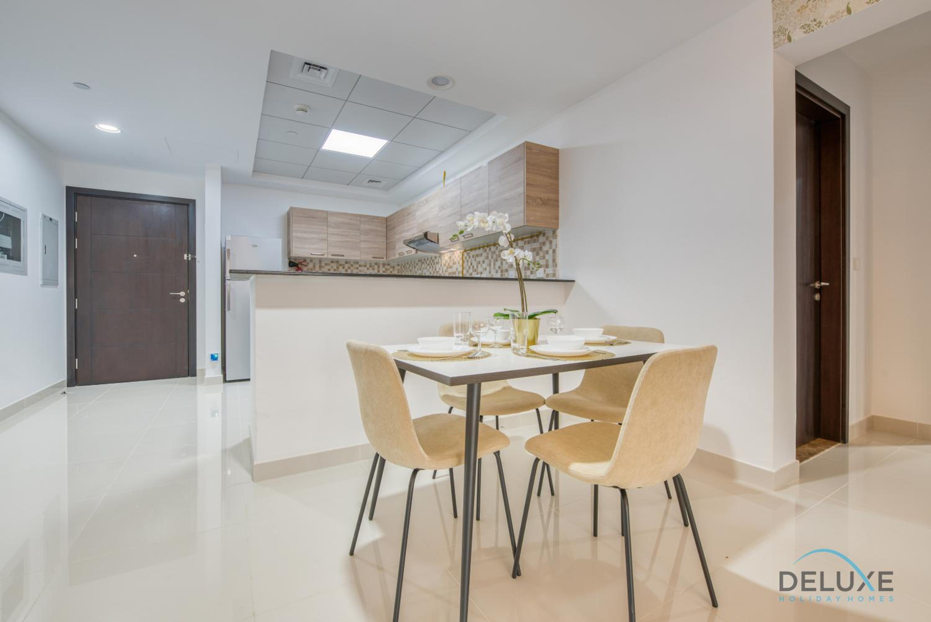 Sunny 1BR at Canal Residences West Dubai Sports City by Deluxe Holiday Homes
