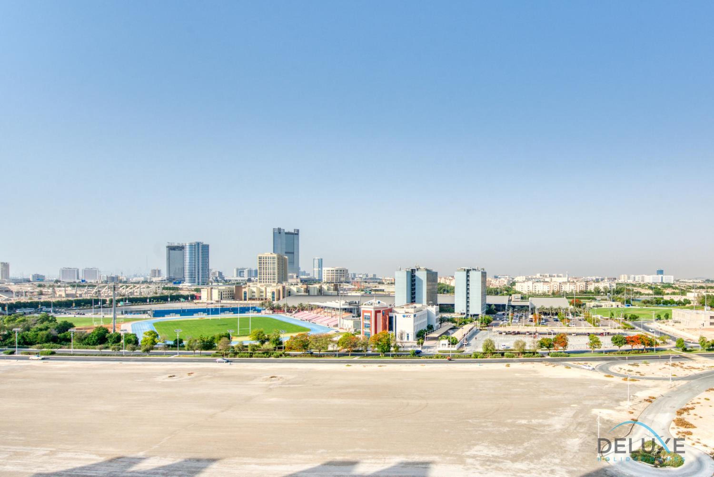 Sunny 1BR at Canal Residences West Dubai Sports City by Deluxe Holiday Homes, photo 19