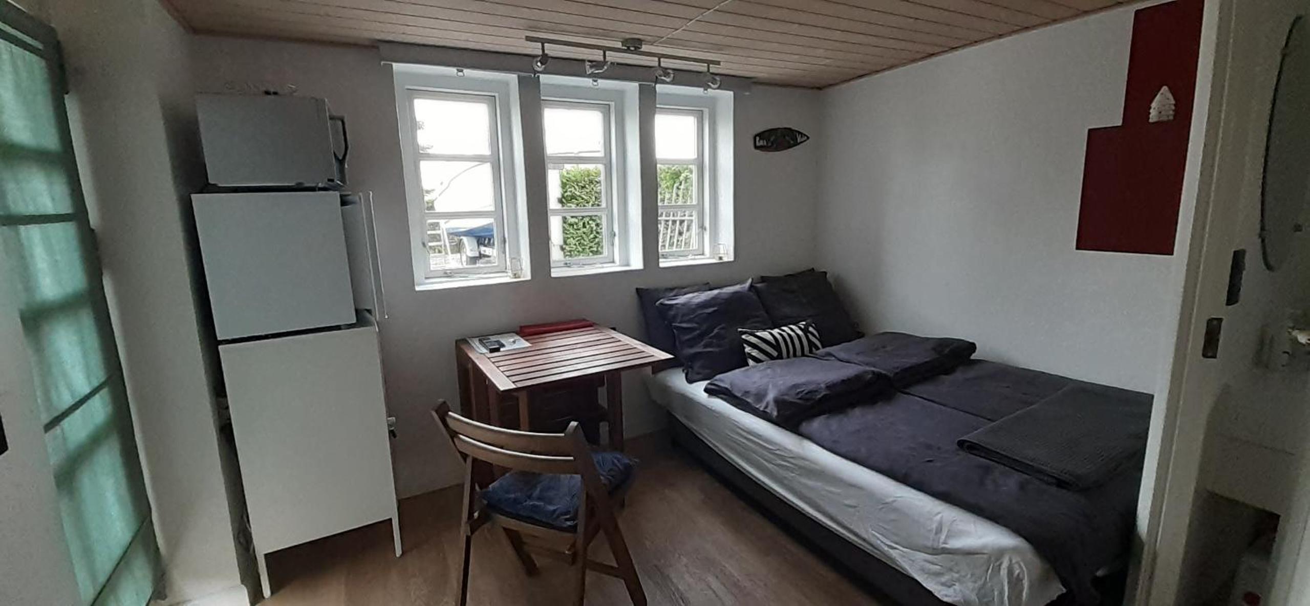 Cozy tiny room, mini kitchen and bathroom view 3
