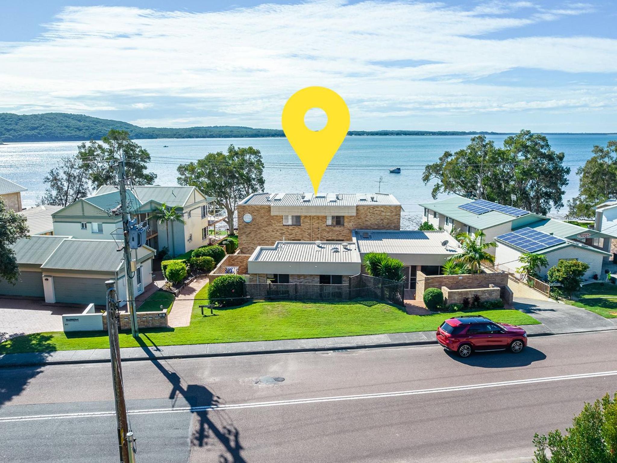 Pelican Sands 2 fantastic waterfront unit with pool and air conditioning