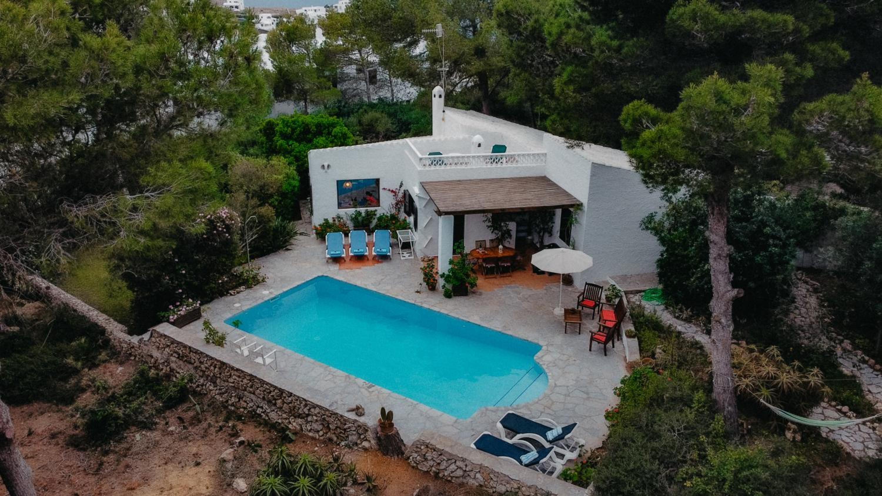 Villa en Cala Morell con piscina privada en el bosque view 2