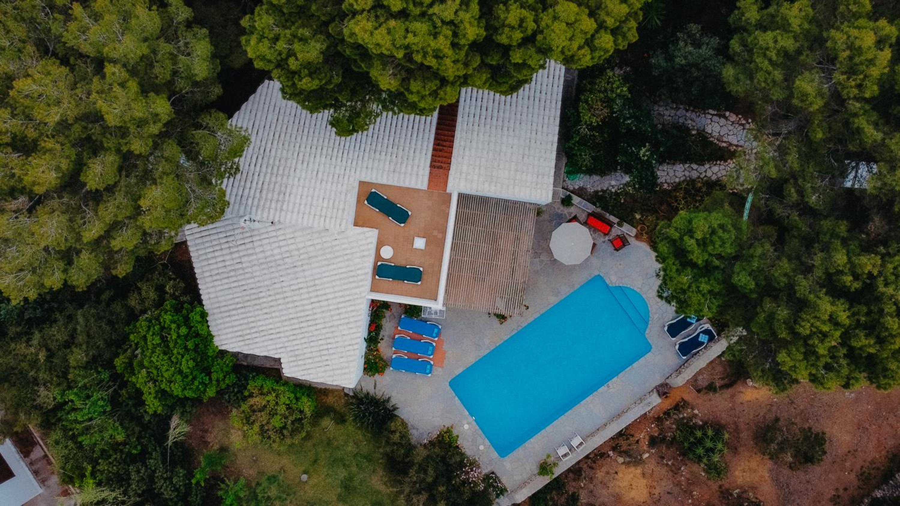 Villa en Cala Morell con piscina privada en el bosque view 4