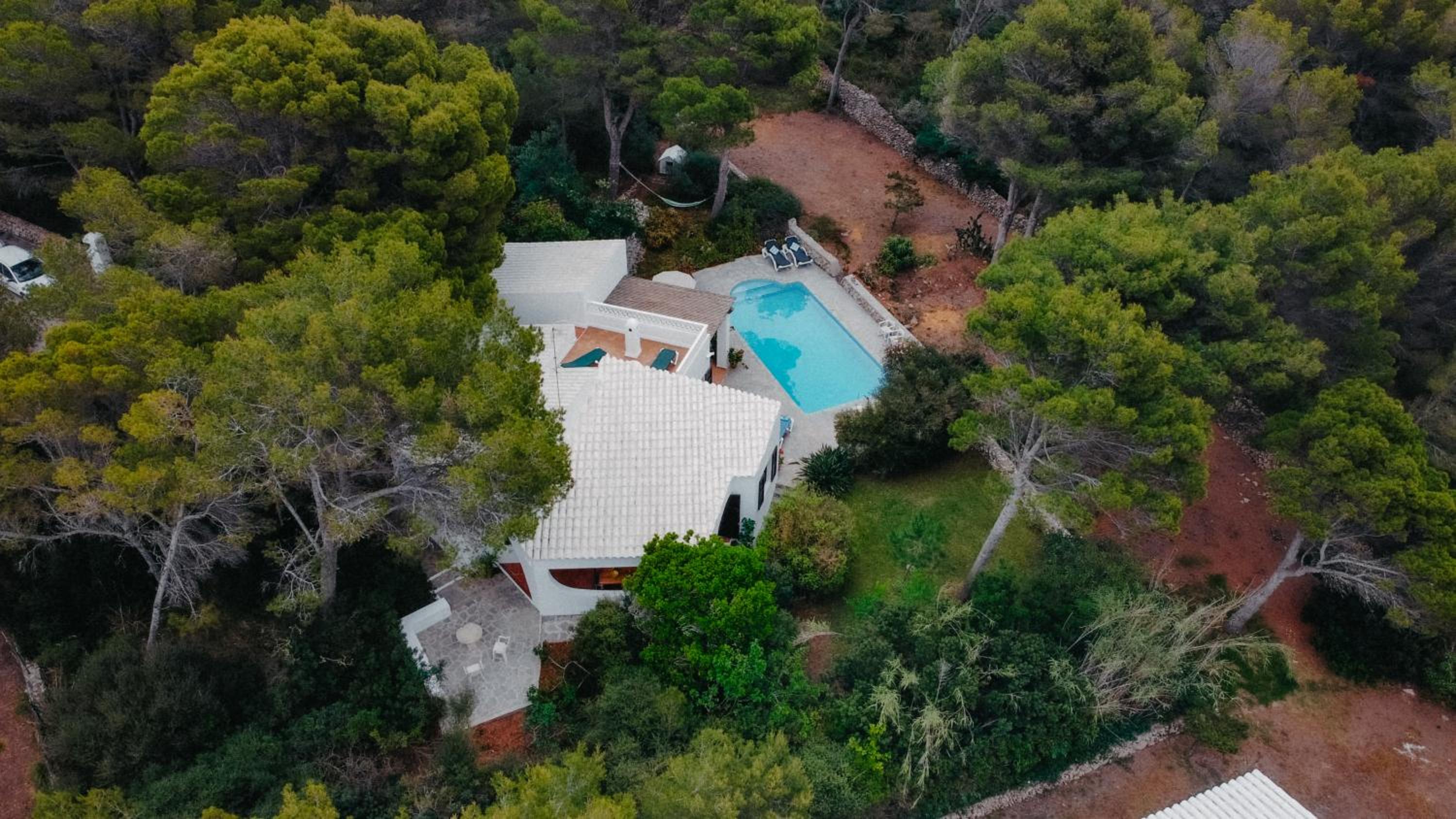 Villa en Cala Morell con piscina privada en el bosque view 3