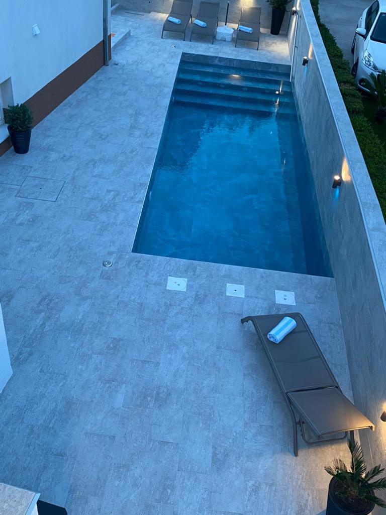 Apartment Villa Rina- Heated salt water Pool view 5