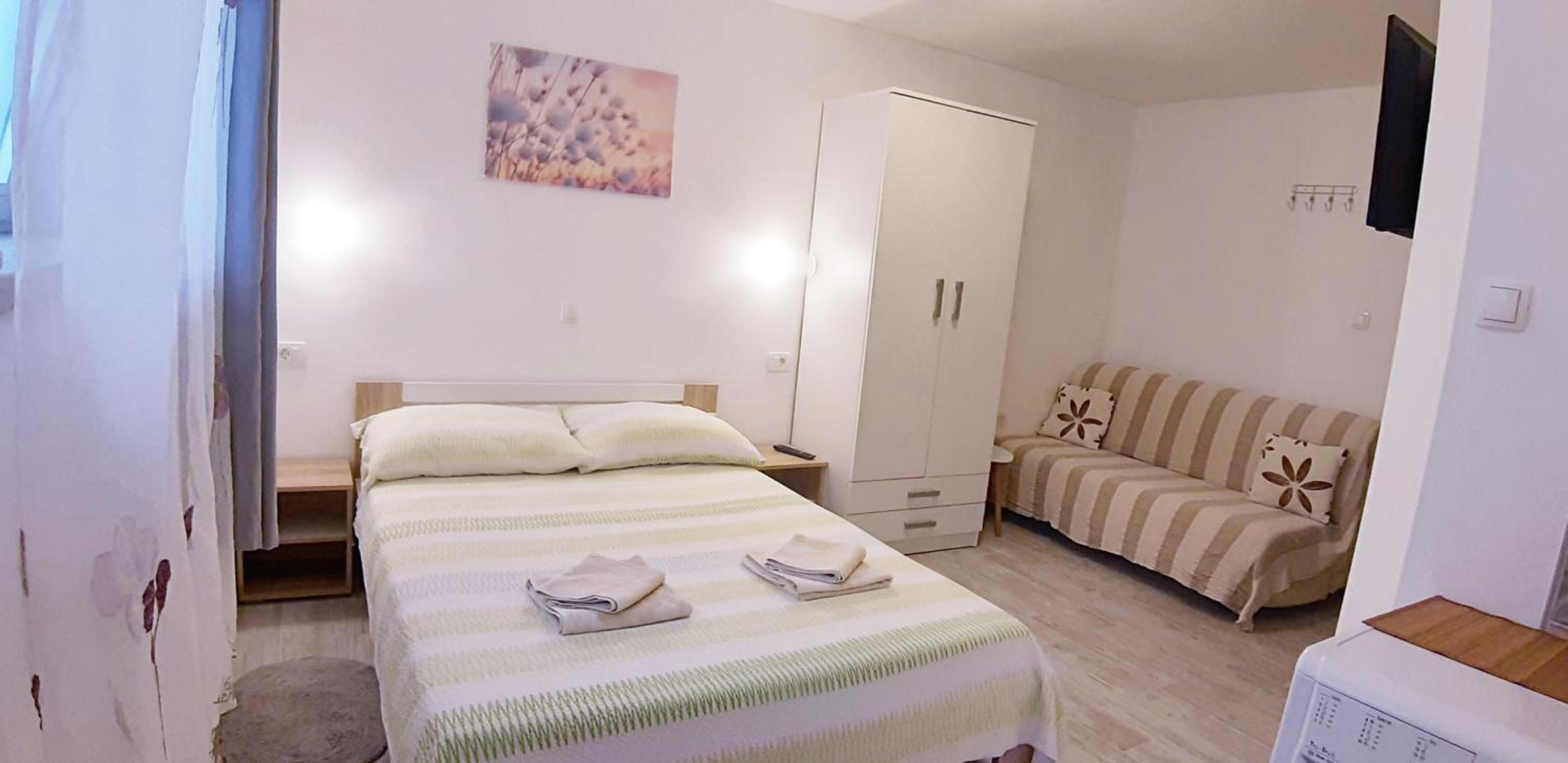 Apartments close to sandy beach view 4