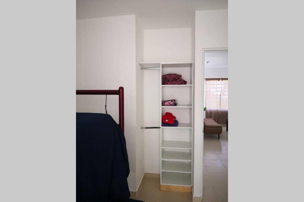 Residencial con seguridad y áreas recreativas.