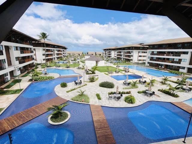 Apartamento em Resort à Beira Mar - Cupe Beach Living
