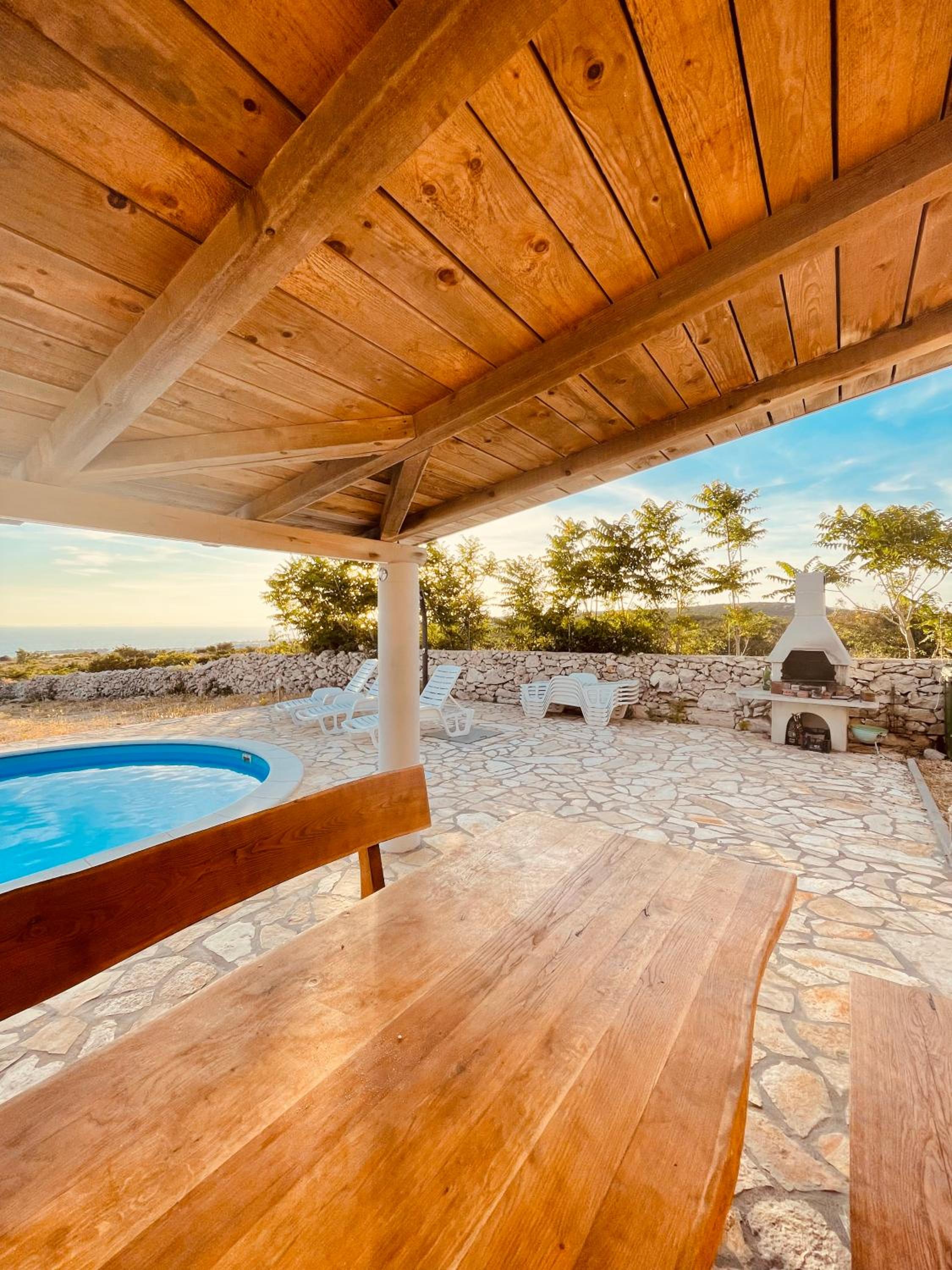 Beautiful secluded area near Novalja vacation house with pool and sea view Villa Lara